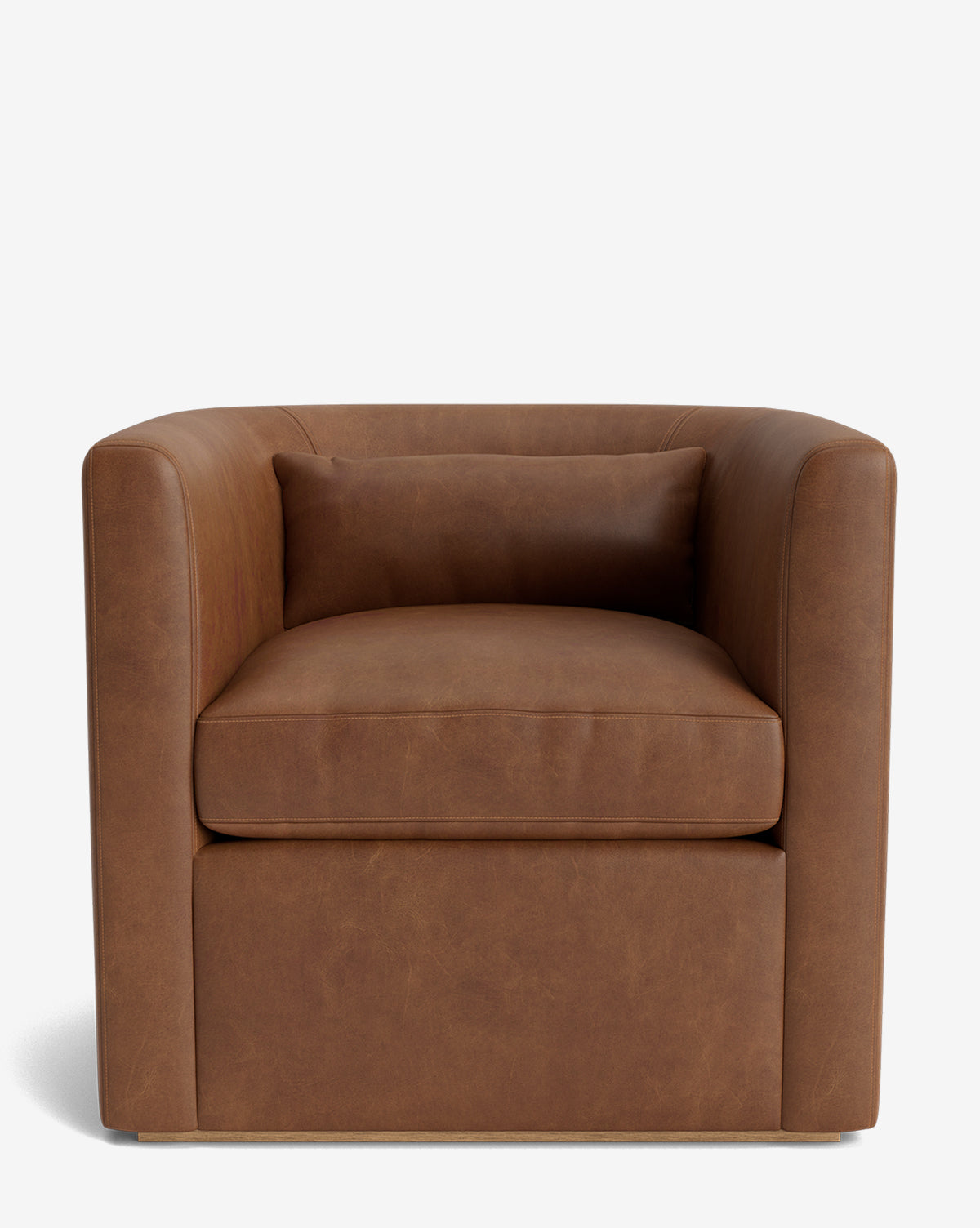 The Reese Lounge Chair features a modern boxy design with smooth brown leather, a handcrafted alder wood frame, thick down-wrapped seat cushion, and matching rectangular back pillow, shown against a plain white backdrop by McGee & Co.