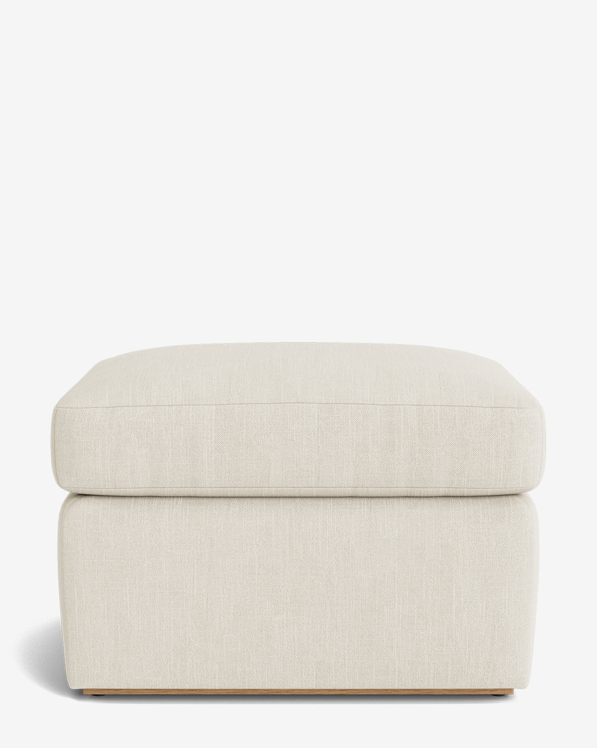 The Reese Ottoman is a handcrafted square ottoman with clean lines and a flat top, shown in light beige against a white background by Vendixs