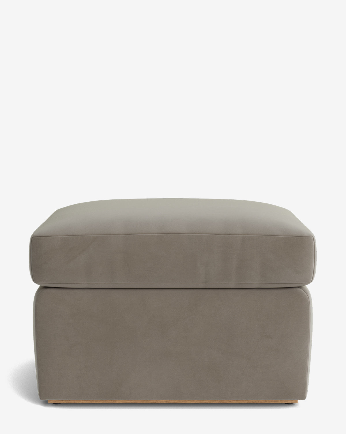 The Reese Ottoman is rectangular, taupe-colored, and features a smooth down-wrapped cushion top with a minimalist design, displayed against a white background by McGee & Co.