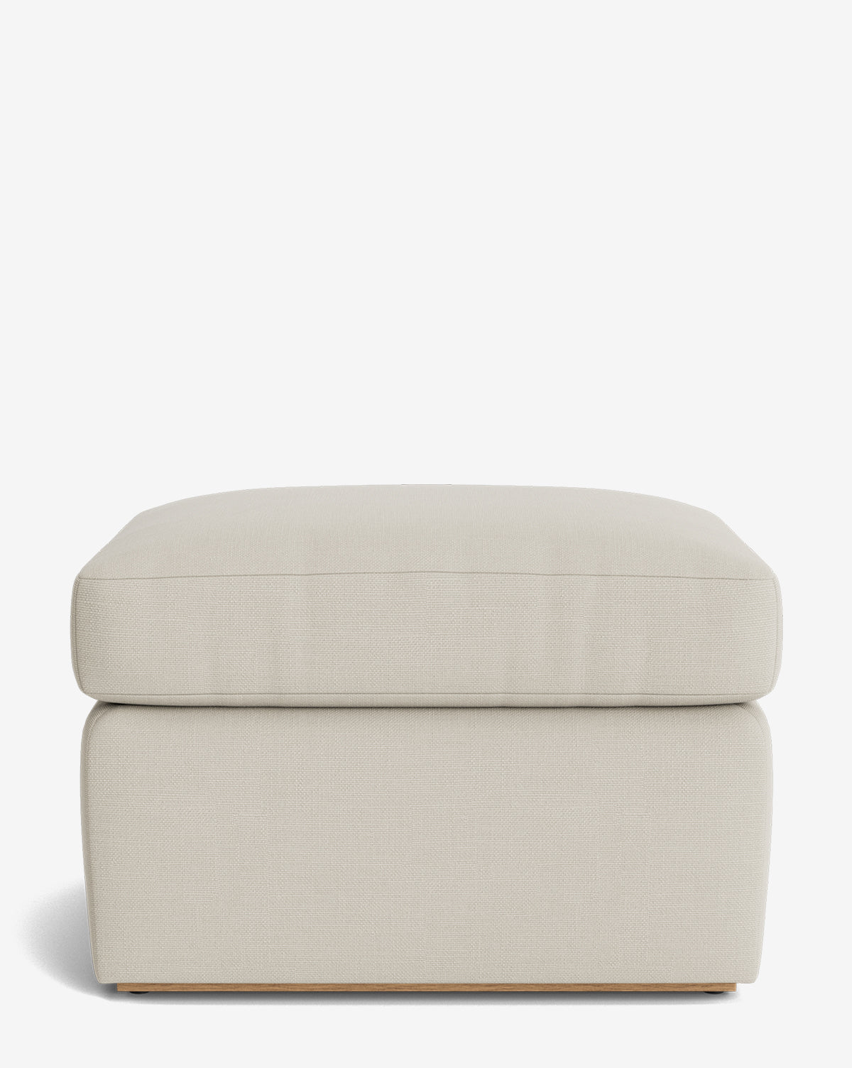 The Reese Ottoman is a modern, rectangular ottoman featuring beige fabric upholstery and a down-wrapped cushion, showcased against a plain white background by Vendixs