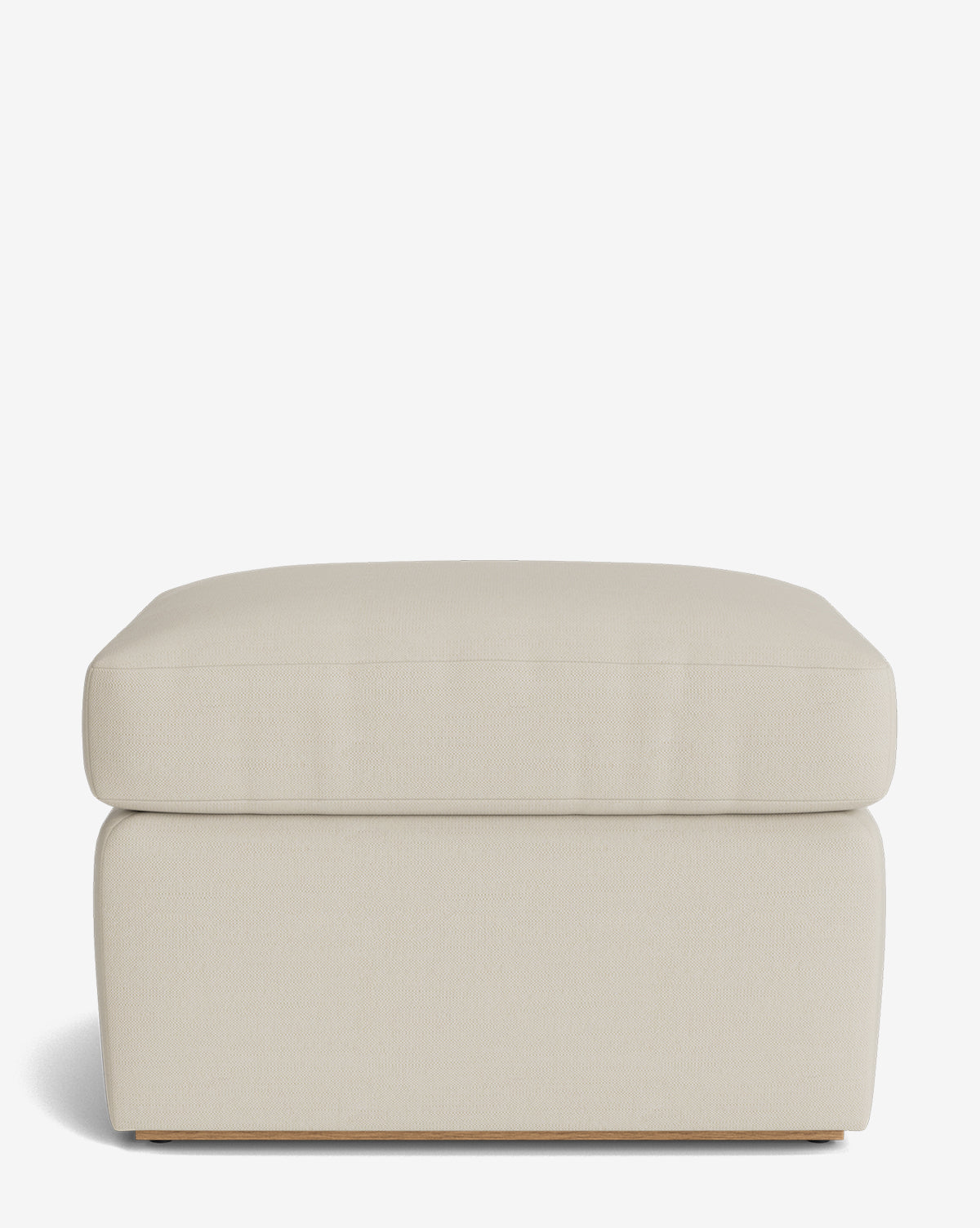 The Reese Ottoman features a modern rectangular design with clean lines and a down-wrapped cushion, shown against a plain white background, by Vendixs