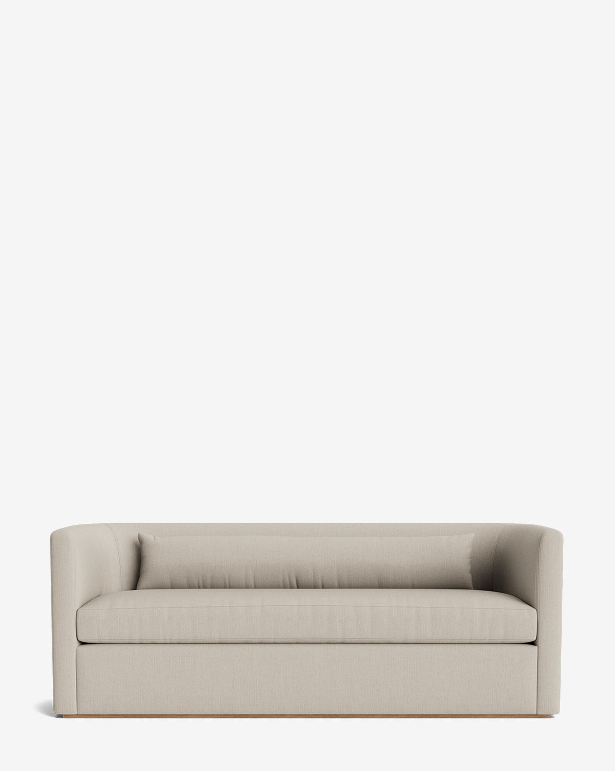 The Reese Sofa (84-96) features light beige upholstery, low arms and back, down-wrapped cushions, and a minimalist design. Handcrafted from alder wood, it offers subtle elegance against a plain white background, by McGee & Co.