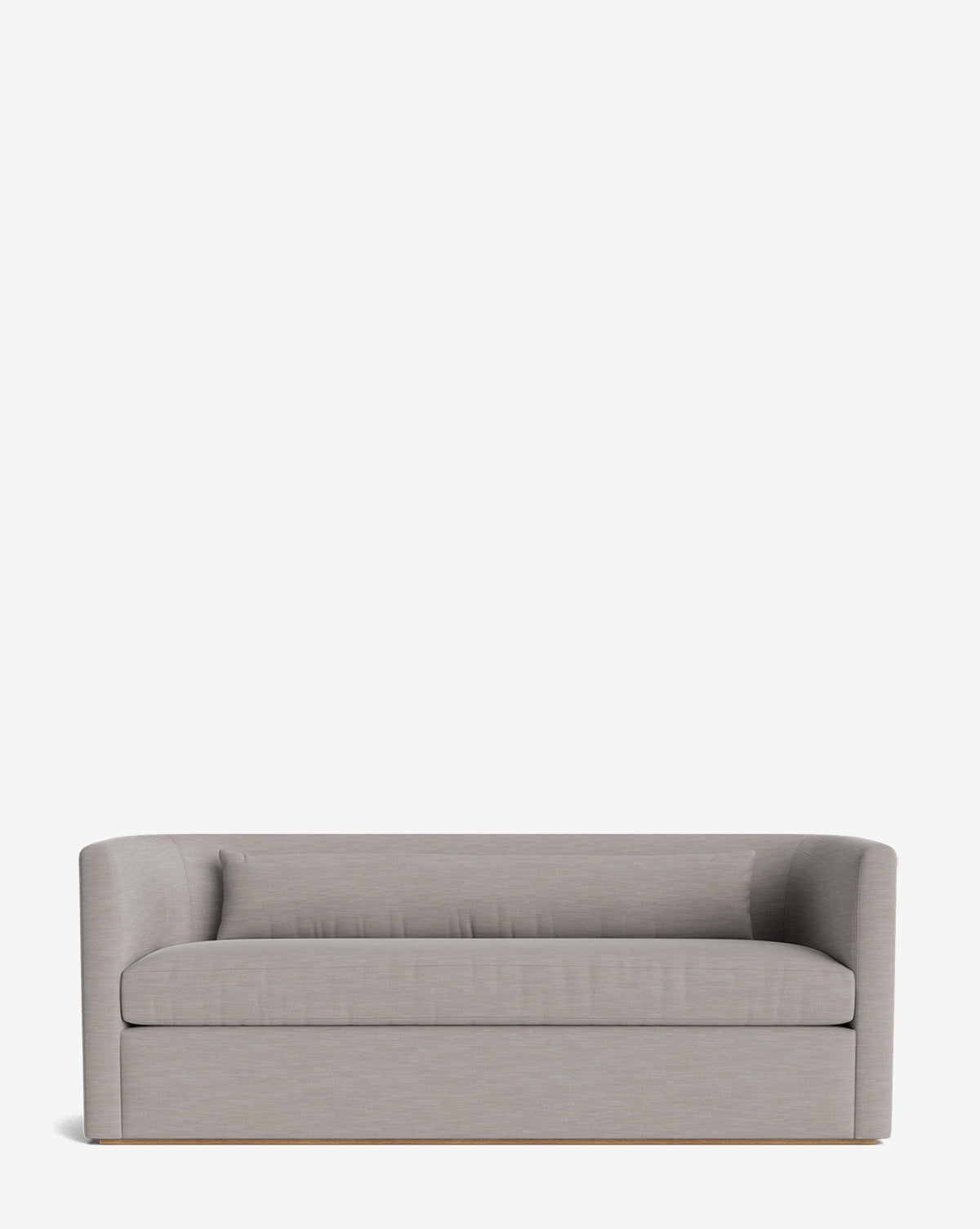 The Reese Sofa (84-96) showcases a modern, light gray upholstered design with a low back and arms, a single down-wrapped cushion, and a minimalist alder wood base, photographed against a plain white background, by Vendixs