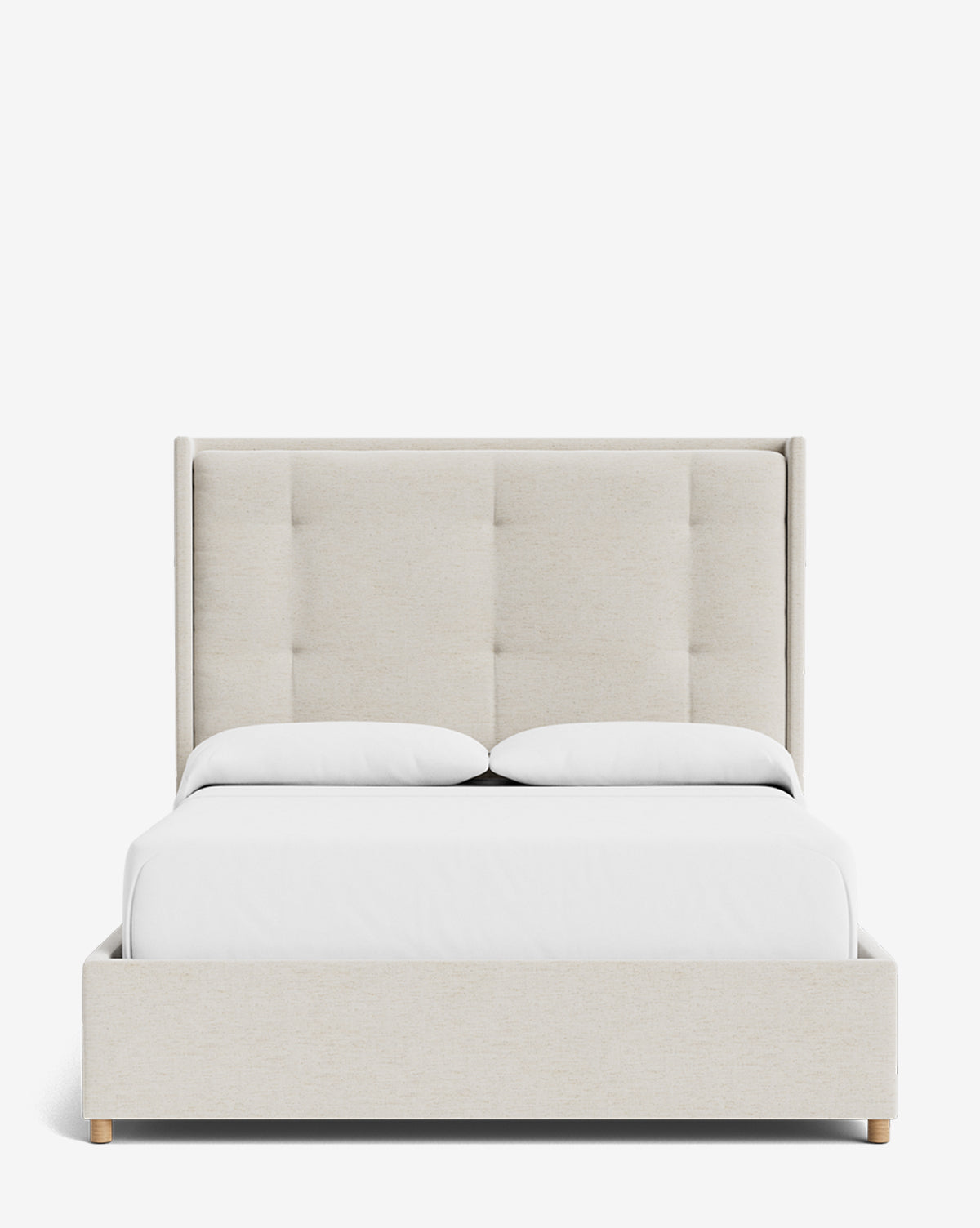The Ria Bed is a modern, customizable upholstered bed in beige with a tall tufted headboard, crisp white bedding, and two pillows, displayed against a plain white background by Vendixs