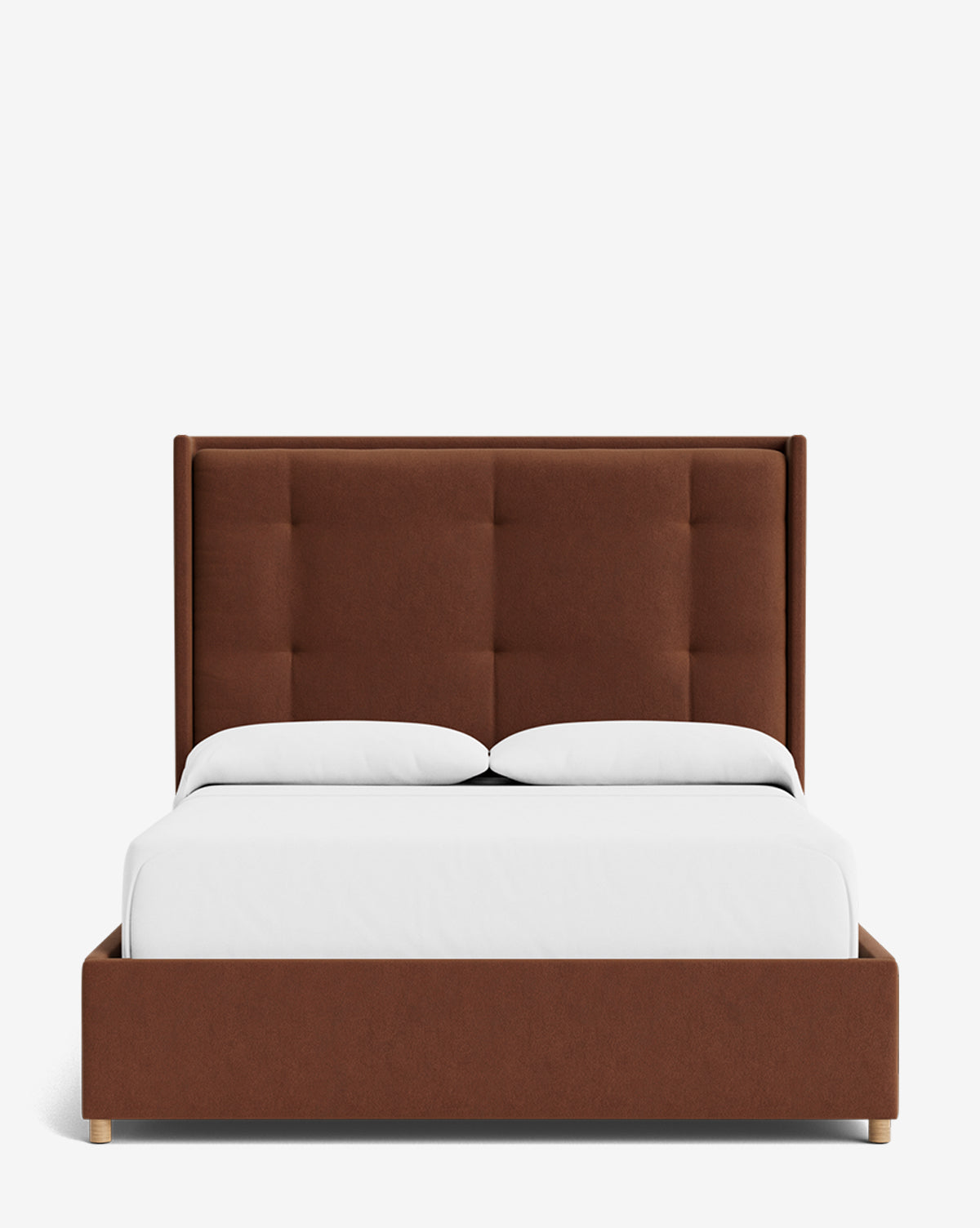 The Ria Bed features a tall brown tufted headboard, white bedding, and a customizable low-profile wooden frame. Shown from the front against a plain white background, it offers modern upholstered elegance for any bedroom, by Vendixs