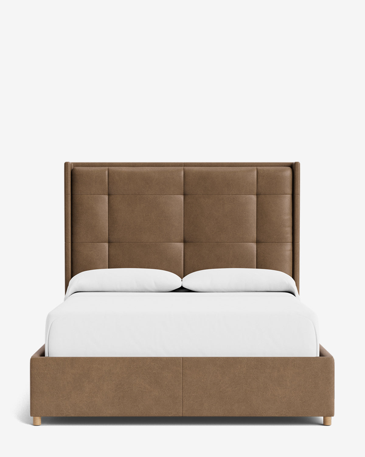 The Ria Bed features a modern, customizable brown upholstered frame with a tall, square-patterned tufted headboard, white bedding, and two pillows, displayed against a plain white background by Vendixs