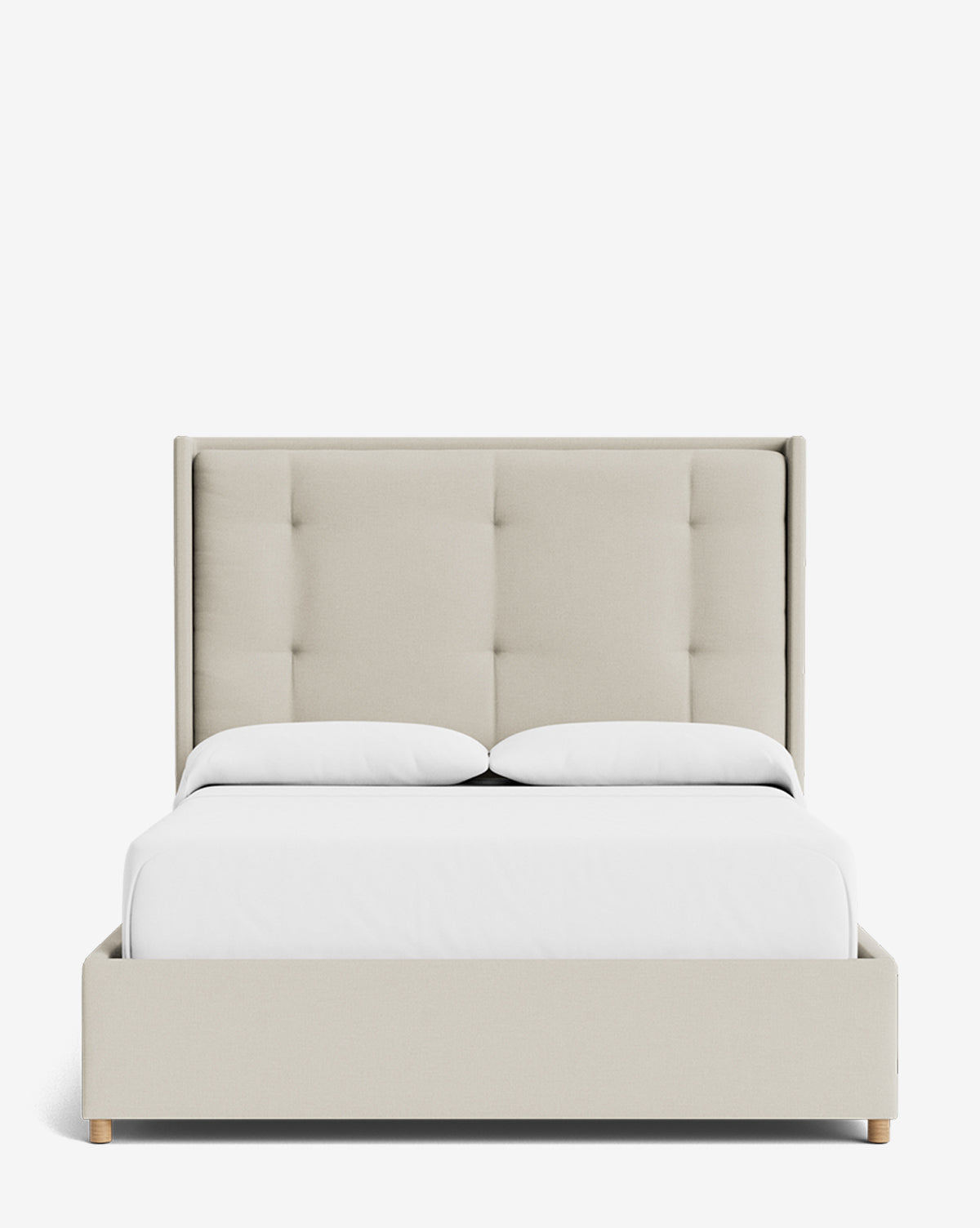 The Ria Bed features a tall, light beige upholstered tufted headboard, two white pillows, a white duvet, and simple light wood feet. Its customizable frame has clean lines and is set against a plain white background, by Vendixs