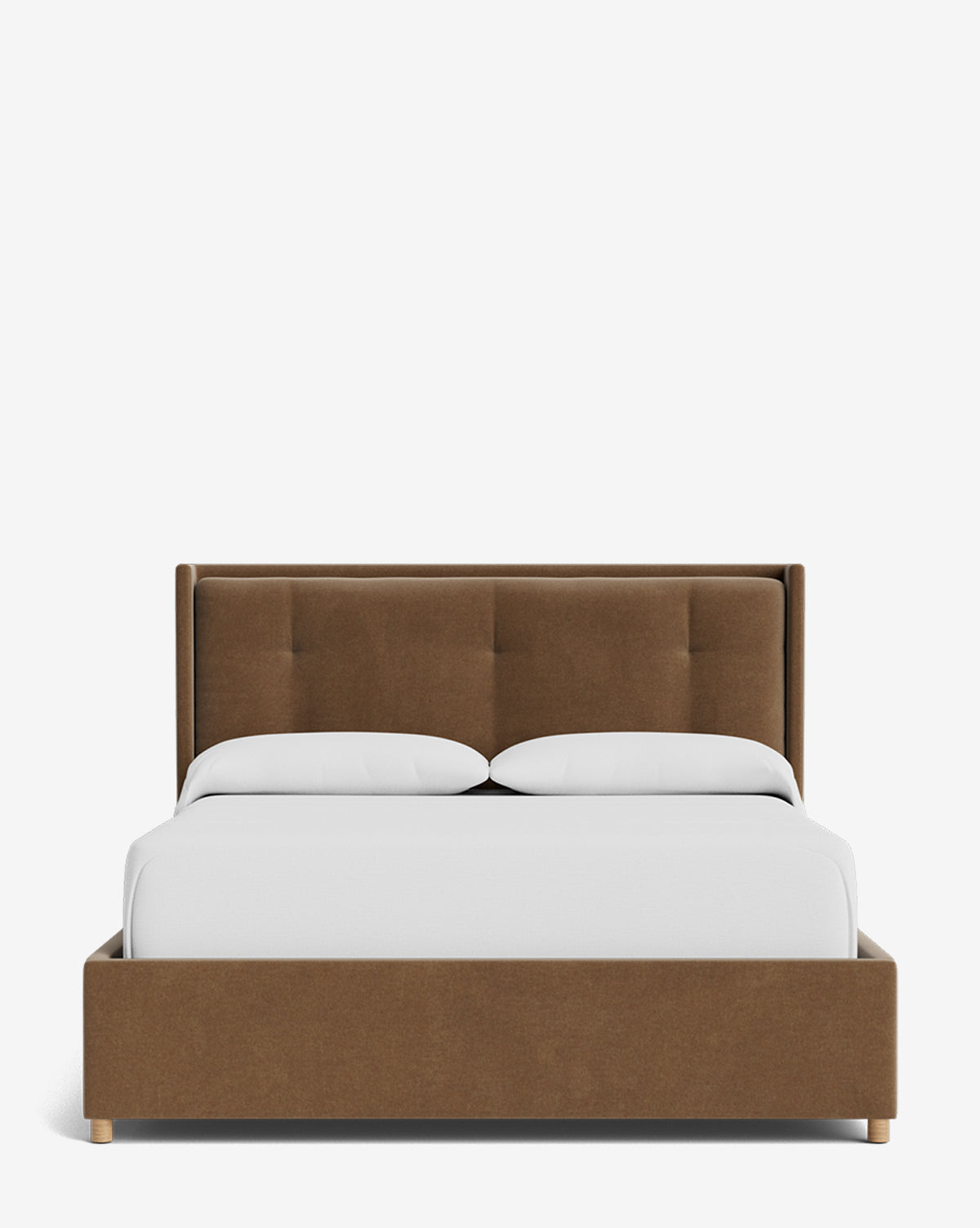The Ria Bed Low Headboard is a modern brown upholstered bed with a tufted low headboard, white bedding, and two pillows, displayed against a plain white background by Vendixs