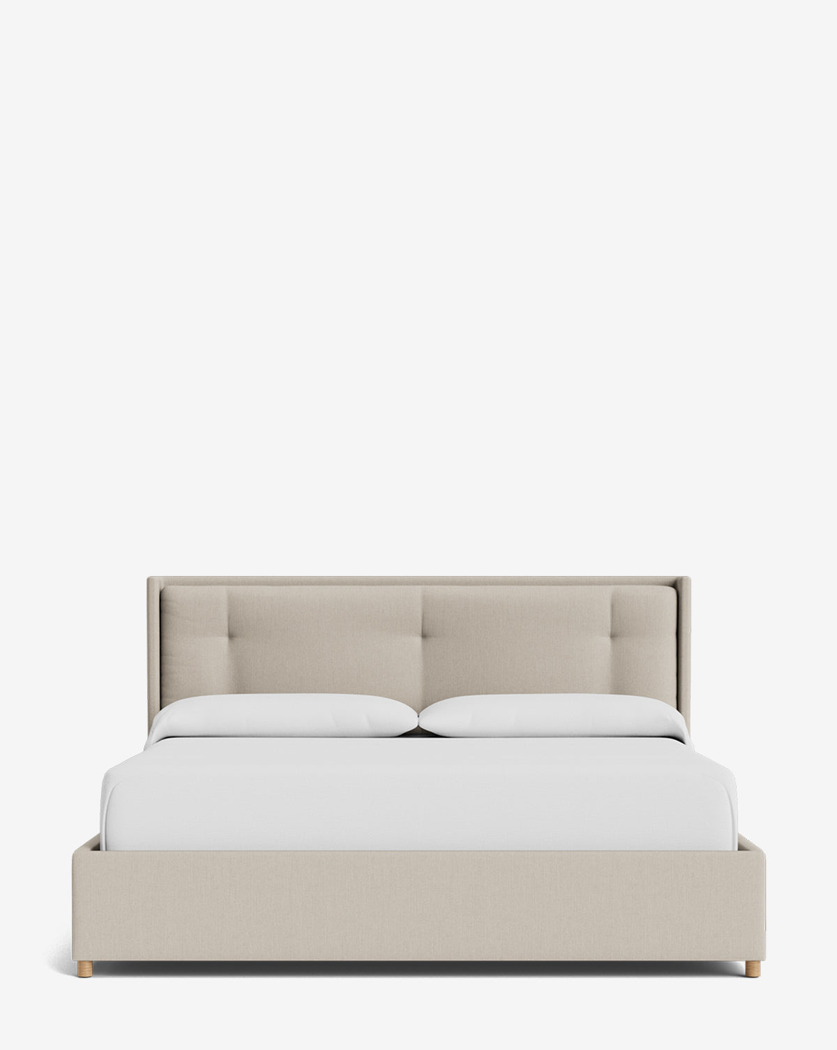 The Ria Bed Low Headboard is a beige upholstered bed with a rectangular, padded headboard, styled with a white duvet and pillows, set against a plain white background by Vendixs