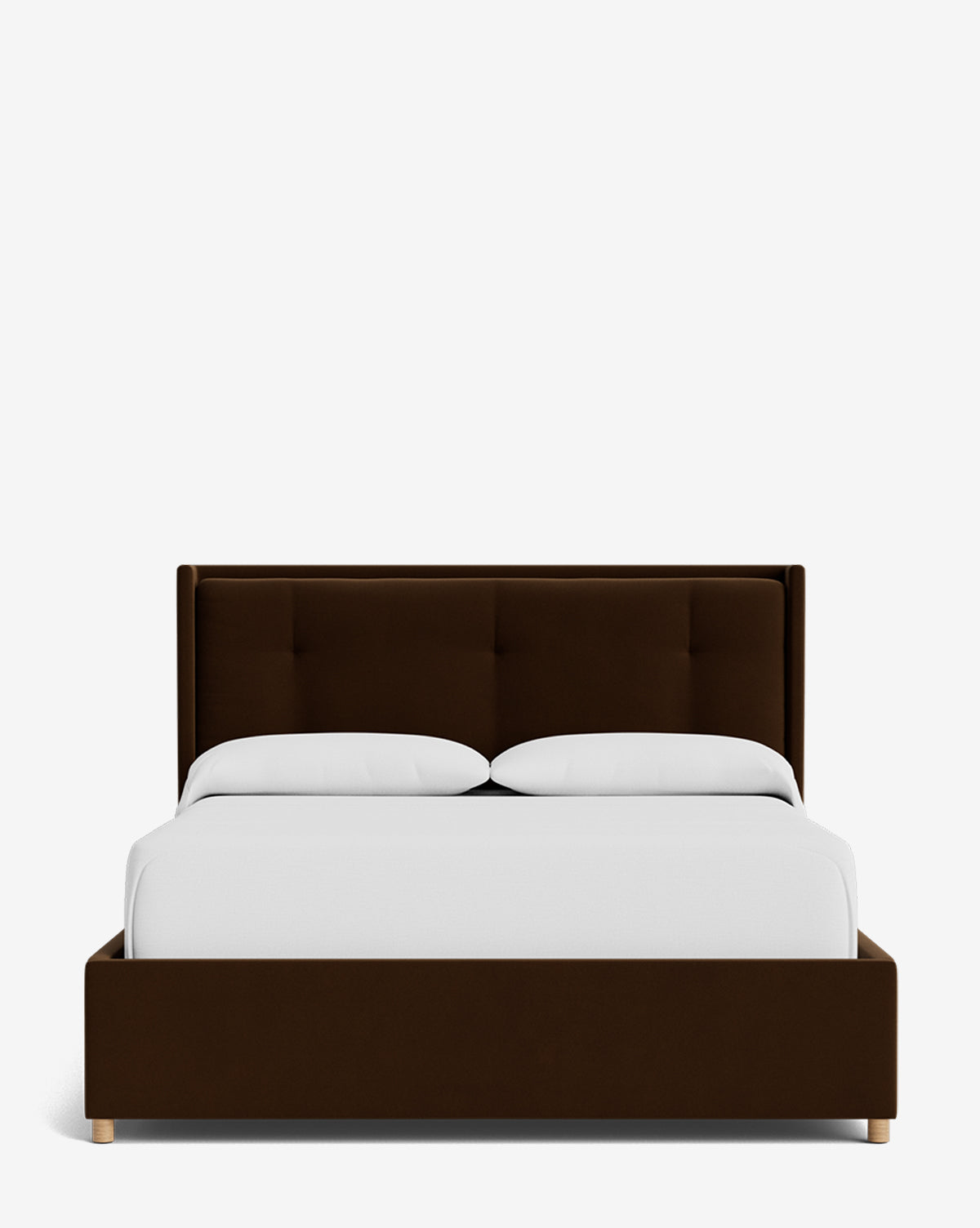 The Ria Bed Low Headboard features a modern dark brown upholstered frame and headboard, two white pillows, and a white duvet, all set against a plain white background for an elegant bedroom look by Vendixs