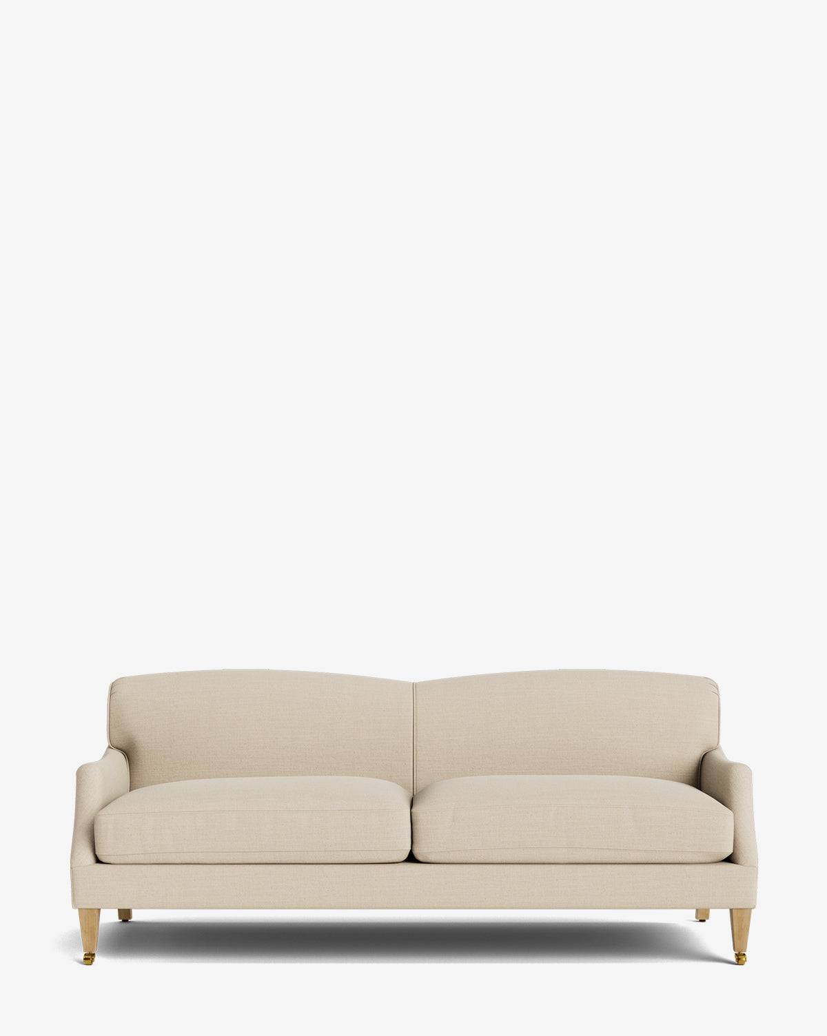 The Rowley Sofa 85 by Rowe Fine Furniture, Inc. is a beige modern three-seater with plush cushions, low arms, and wooden legs with brass caps; it’s hand-crafted and customizable in fabric, shown here on a plain white background. Vendixs