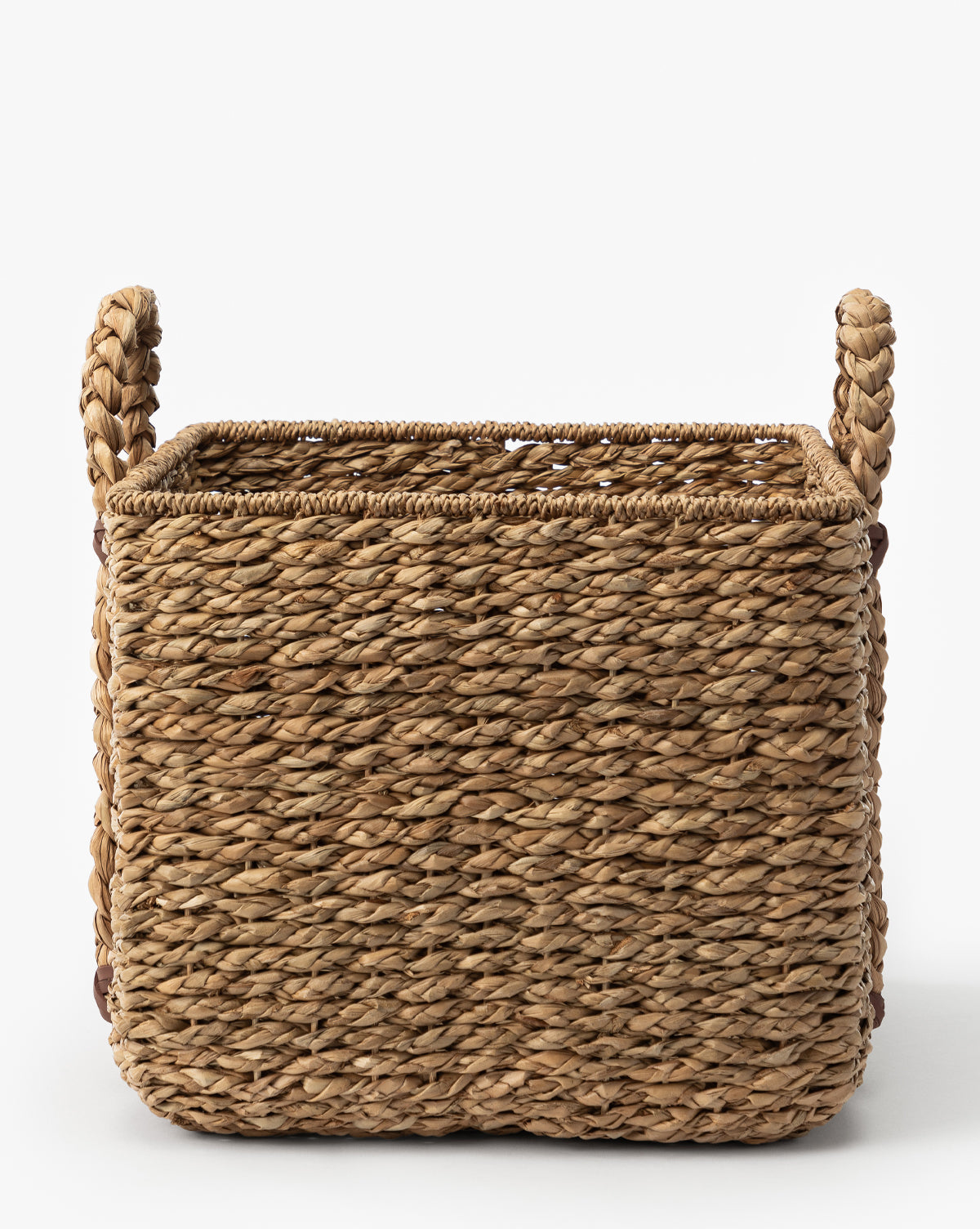 The Salter Woven Square Basket features a rectangular seagrass design with two thick, braided side handles, displayed against a plain white background, by Vendixs