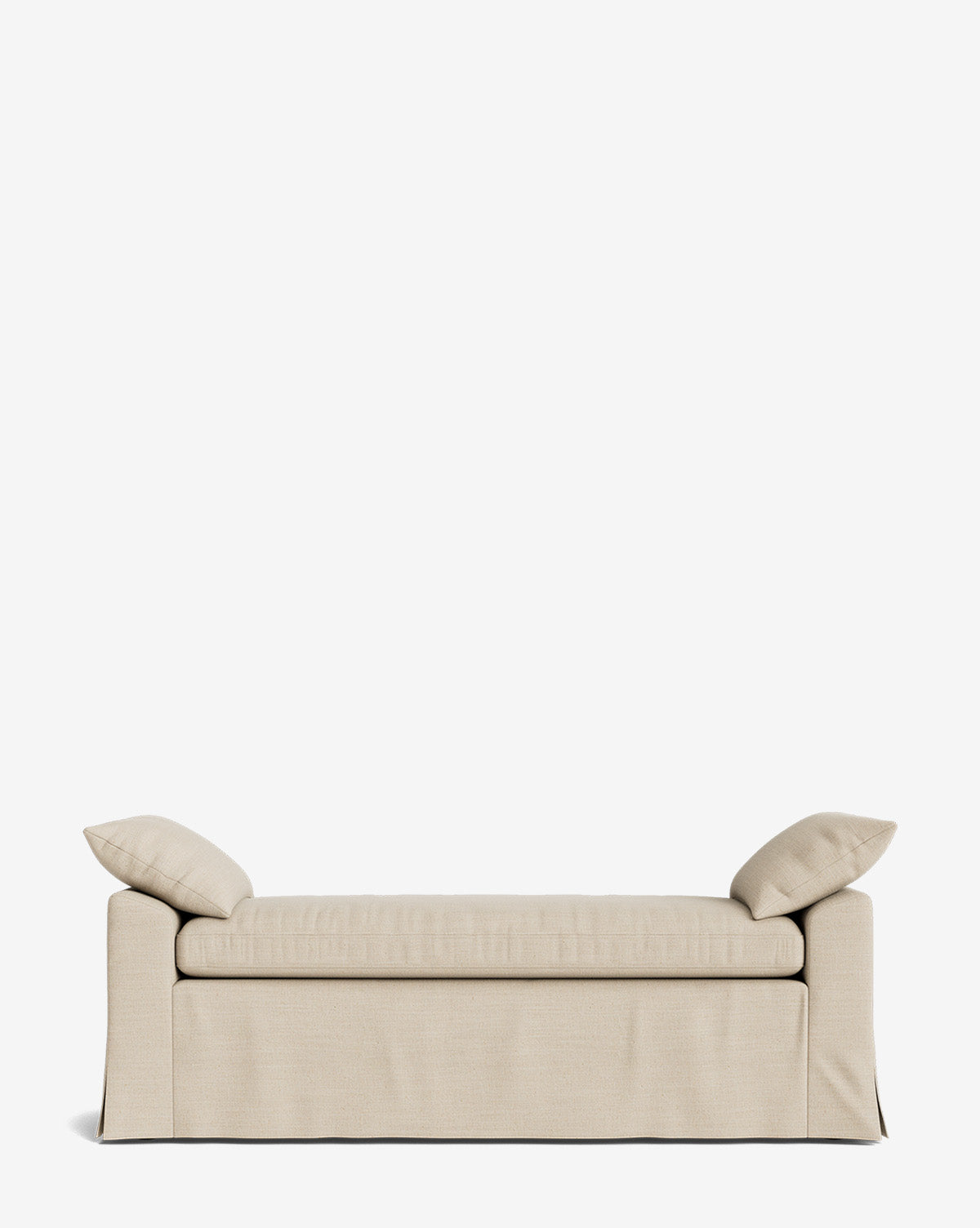 The Scaletta Bench features performance fabric upholstery in beige, a skirted base, and comes with two matching angled throw pillows, shown against a plain white background by Vendixs