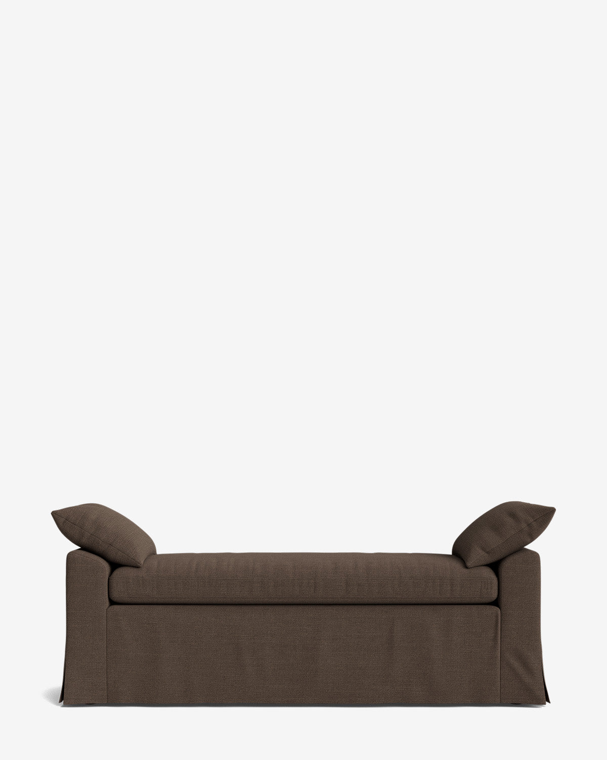 The Scaletta Bench, a brown upholstered piece with two matching cushions and a skirted base, features performance fabrics and clean lines, offering modern comfort and sleek design against a plain white background, by Vendixs
