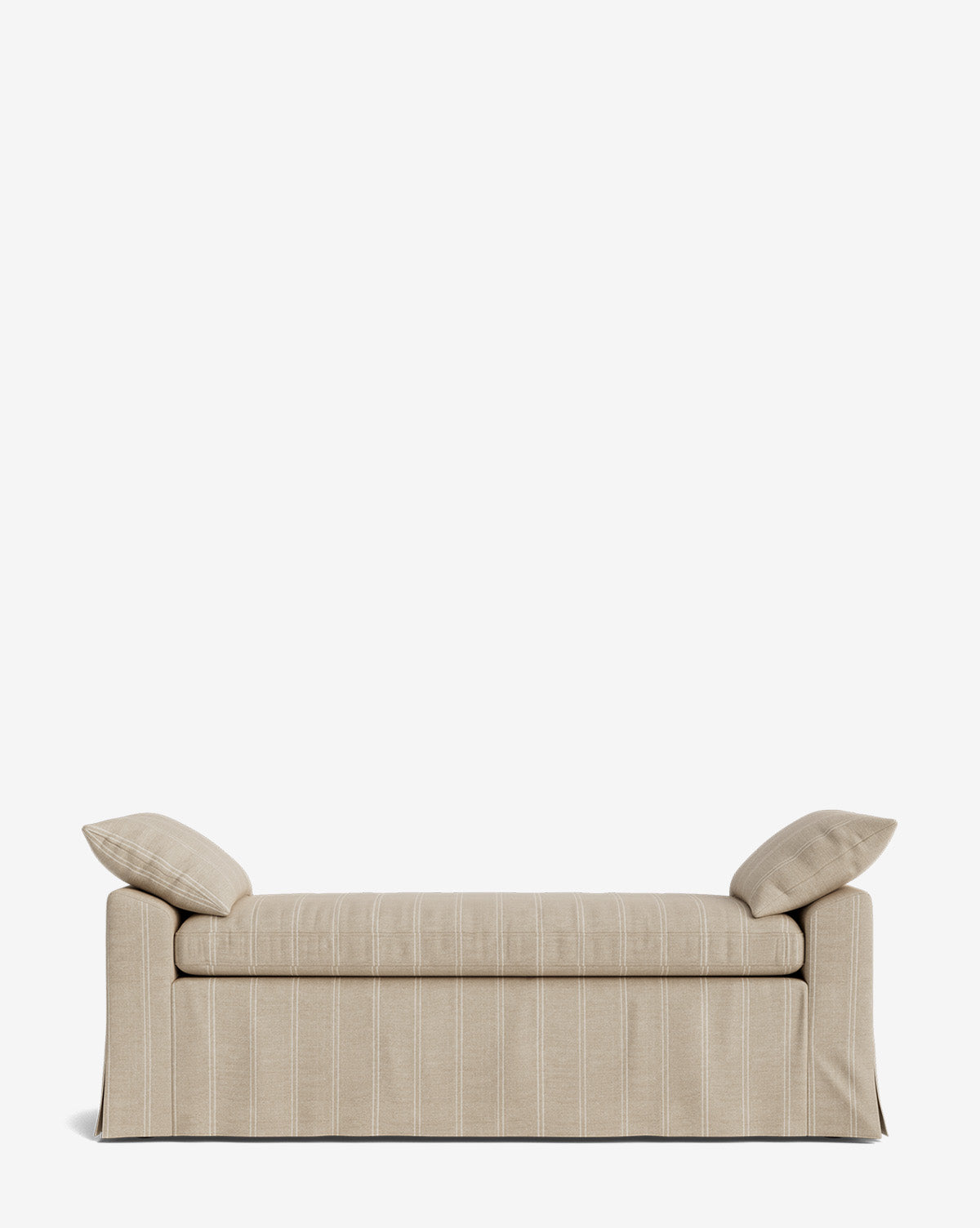 The Scaletta Bench, upholstered in beige performance fabric with subtle vertical stripes, includes two matching end cushions and a tailored skirt over the legs, displayed against a plain white background by McGee & Co.