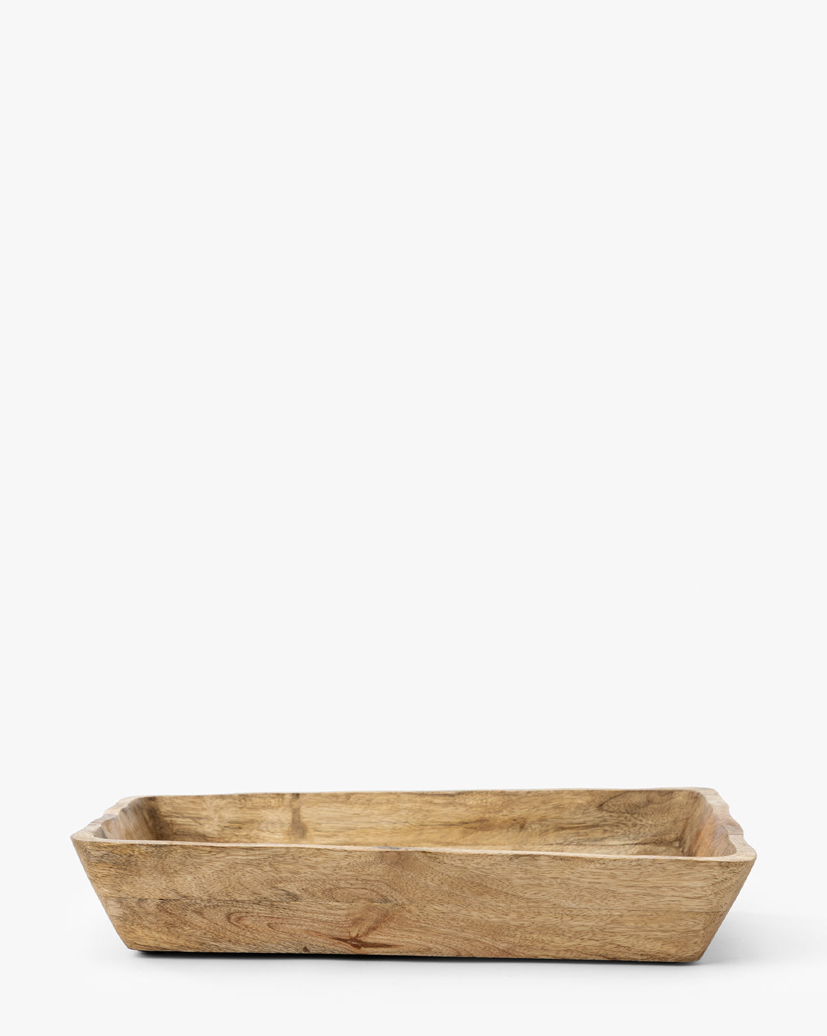 The Scalloped Wood Tray is a rectangular, shallow handcrafted mango wood tray featuring smooth, natural grain, shown on a plain white background by Vendixs