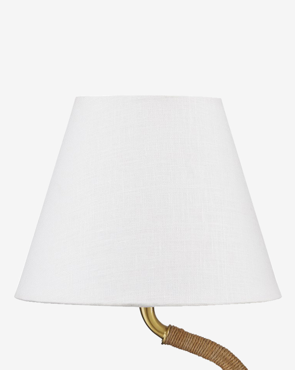The Sirocco Desk Lamp features a white, cone-shaped textured fabric shade atop an antique brass and natural rope-wrapped stem, shown against a plain white background by McGee & Co.