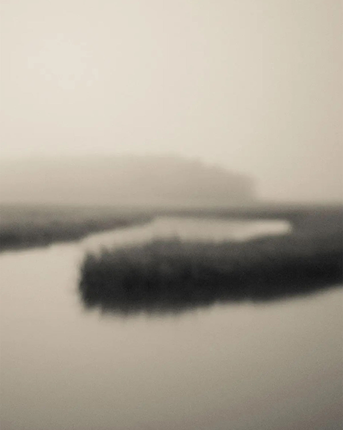 Soft Atlantic Coast by Susan Currie features a blurred, monochrome view of a winding river with reeds and distant trees beneath a hazy sky, presented as a gallery-quality giclee on canvas, by Vendixs