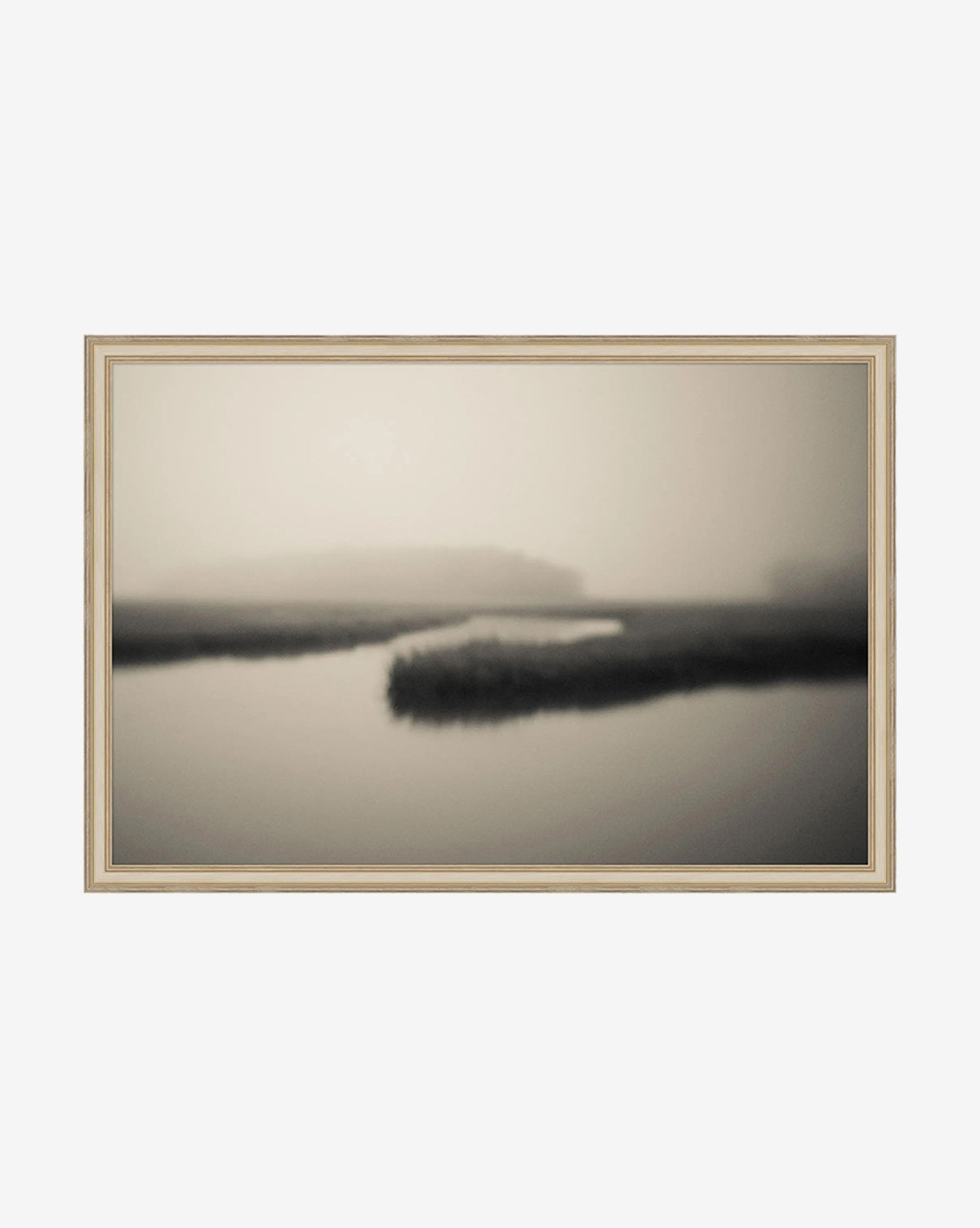 Soft Atlantic Coast by Susan Currie is a framed, black and white giclee on canvas featuring a blurred calm river winding through misty marshland, perfect for creating a serene and minimalist atmosphere, by Vendixs