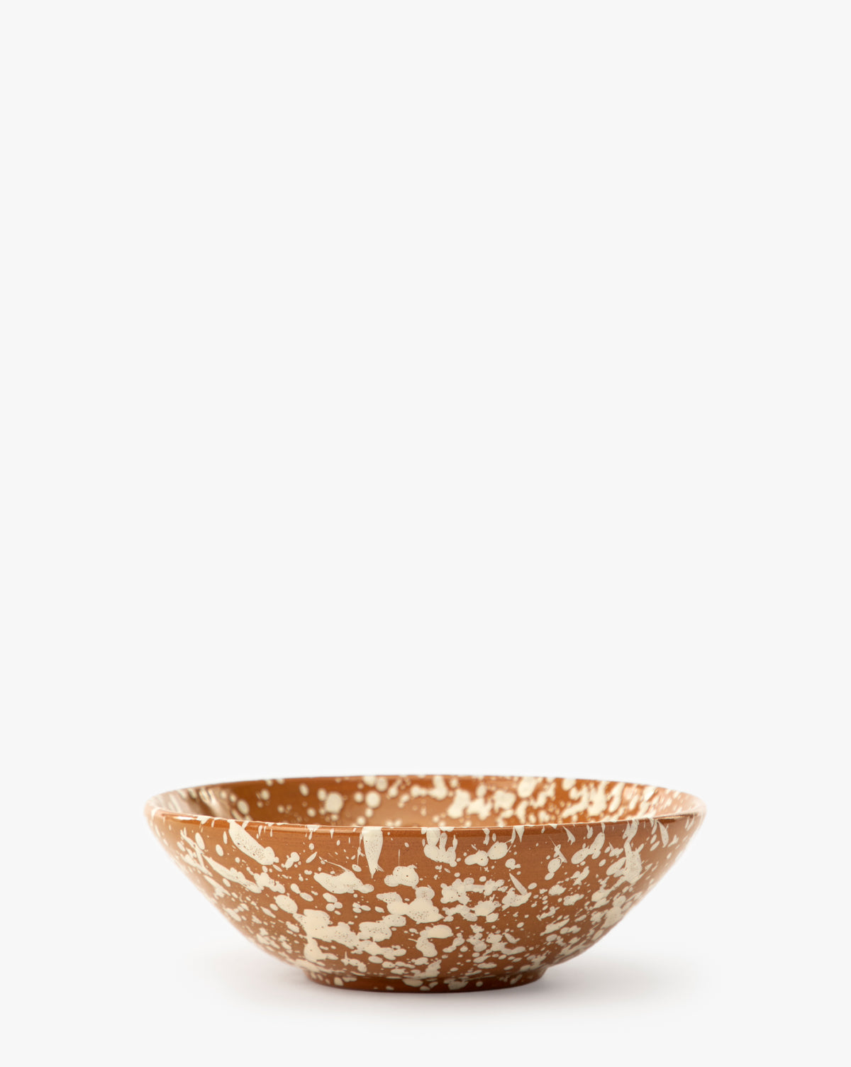 The Splatter Large Bowl, featuring a brown base and white speckled design, highlights artisan ceramic craftsmanship against a plain white background, by Vendixs