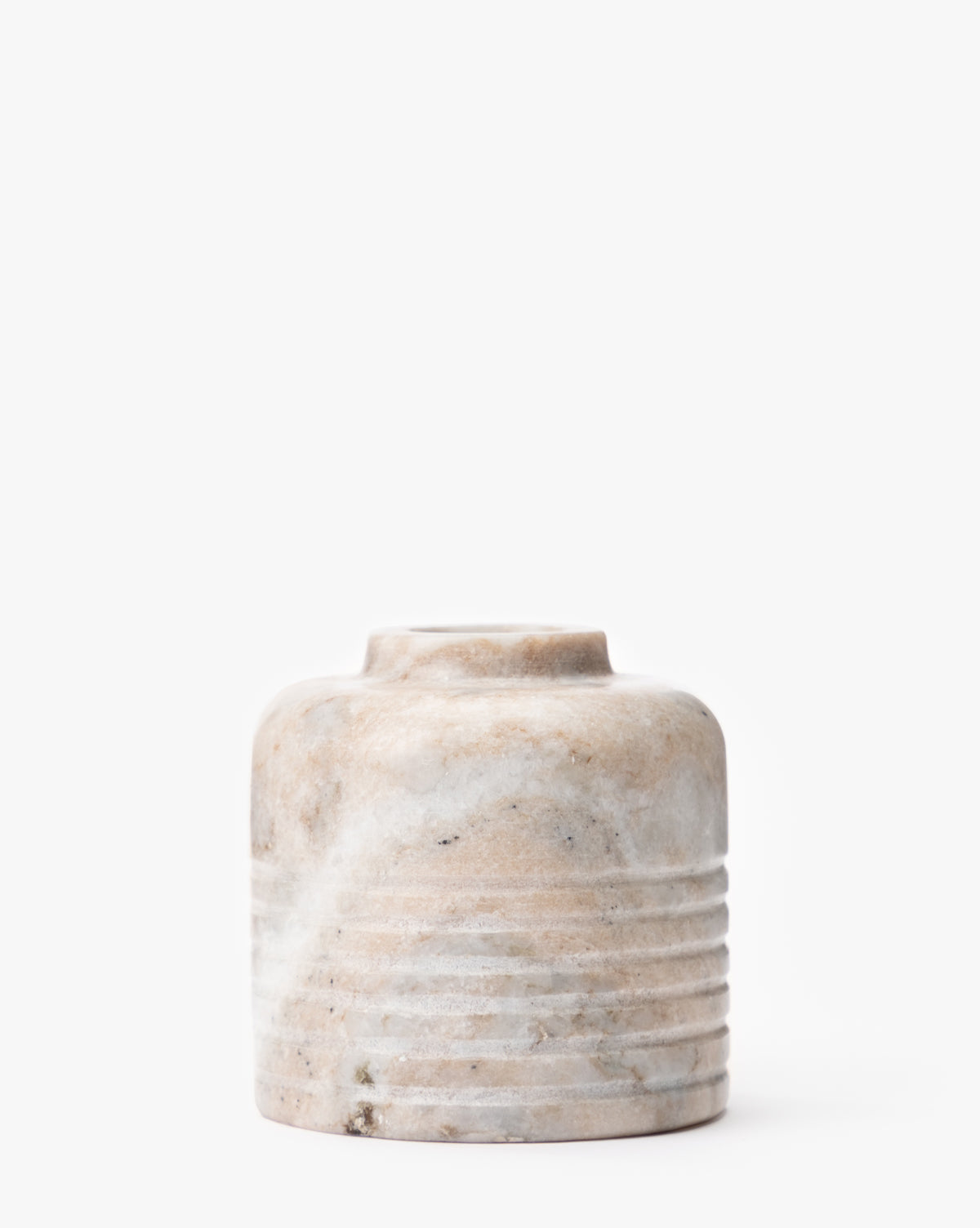 The Stinson Marble Bud Vase is a small, round vase with a marbled beige and white finish and horizontal ridges on the lower half. It features an elegant short, narrow neck and is displayed against a plain white background, by Vendixs