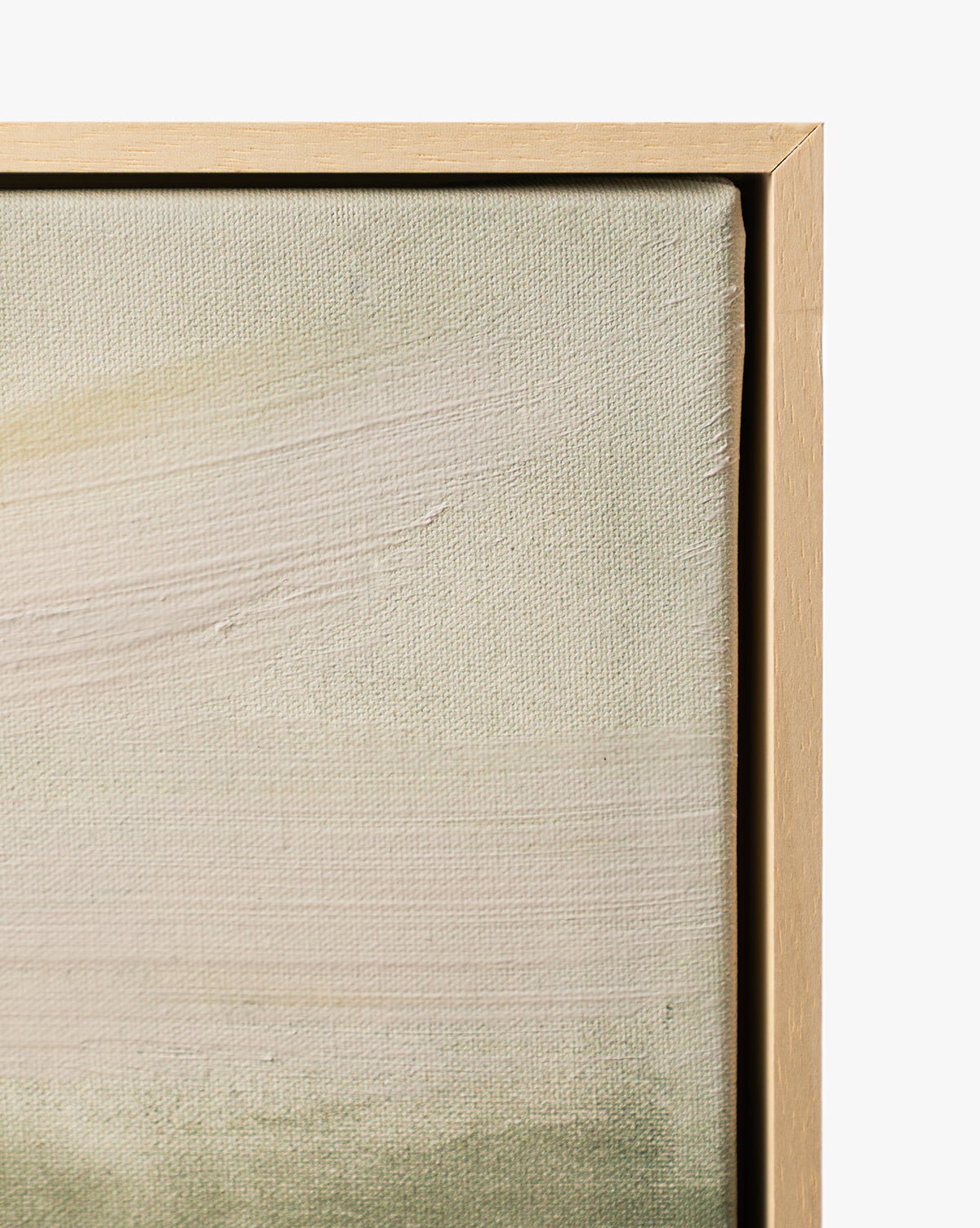 Close-up of Stormy Sky Afternoon, a gallery-wrapped canvas with textured brushstrokes in soft cream and green tones, finished with a light wood frame—an elegant piece of framed wall art for any space, by Vendixs