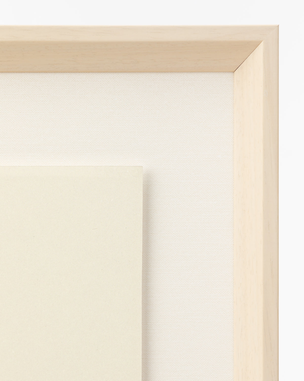Close-up of two layered blank canvases with light wooden frames, ideal for a childs room or as the perfect base for your Strawberry Collage, displayed against a plain white background, by Vendixs