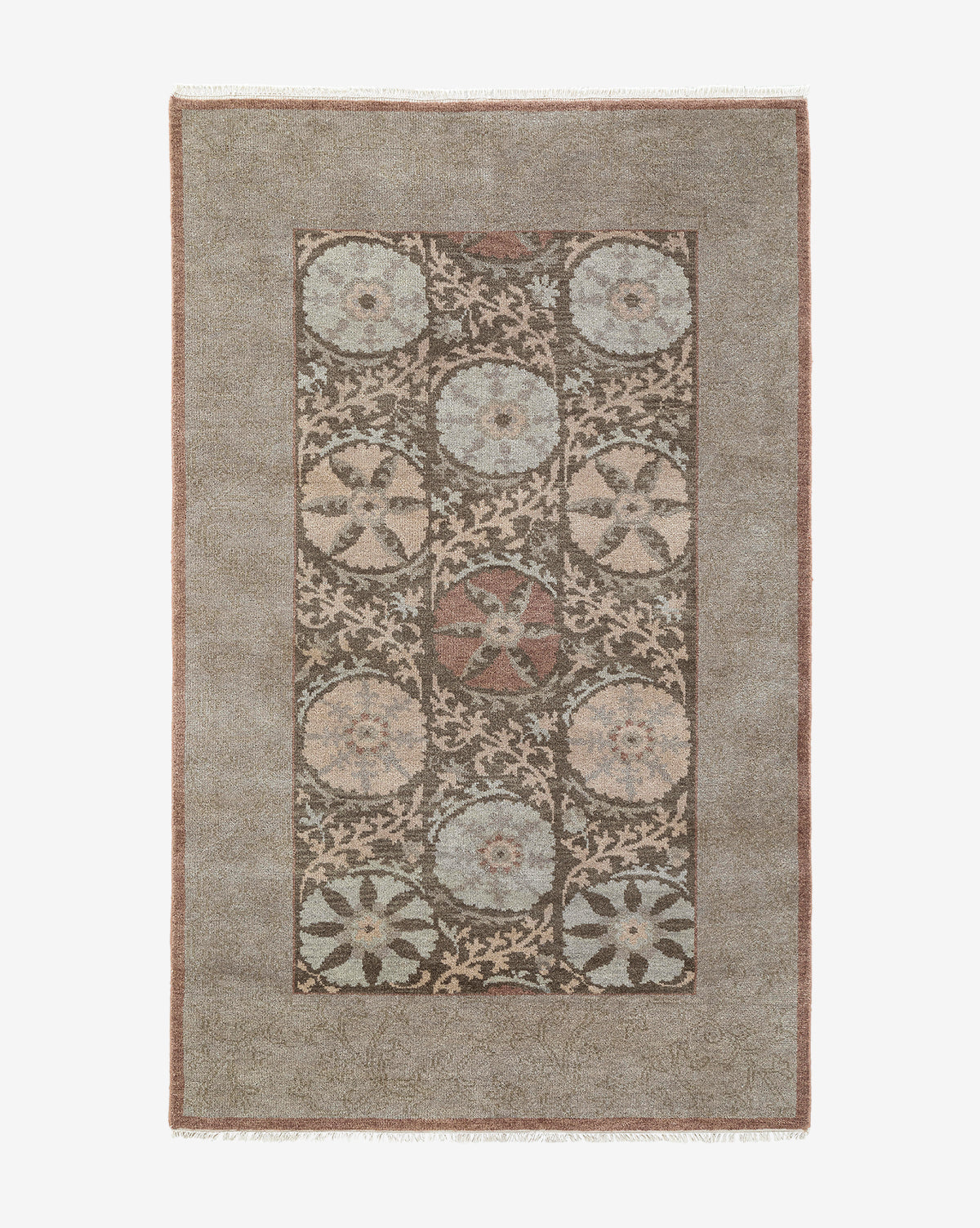 The Suzani Hand-Knotted Wool Rug displays circular floral medallions in muted blue, beige, and brown within a central panel, framed by a plain taupe border, by Vendixs