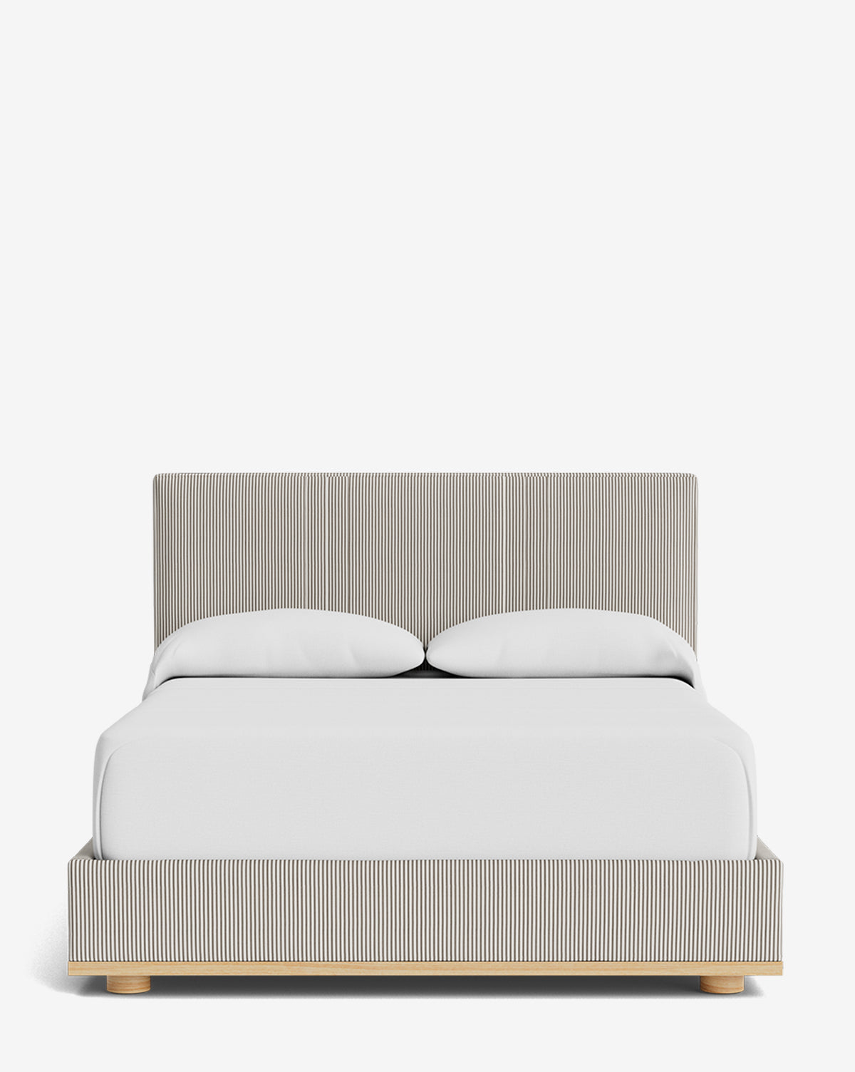 The Taylor Pleated Bed features a low wooden base, a vertically striped designer fabric headboard and frame, plus white bedding with two pillows, shown against a plain white background, by Vendixs