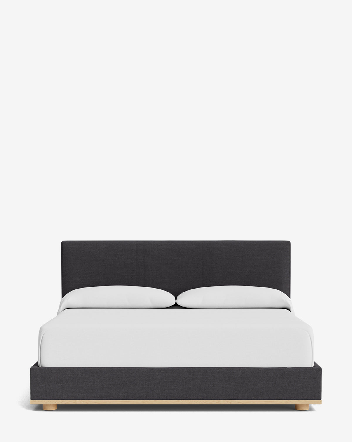 The Taylor Pleated Bed features a dark gray designer fabric frame and headboard, styled with white bedding and two pillows, set against a plain white background, by McGee & Co.