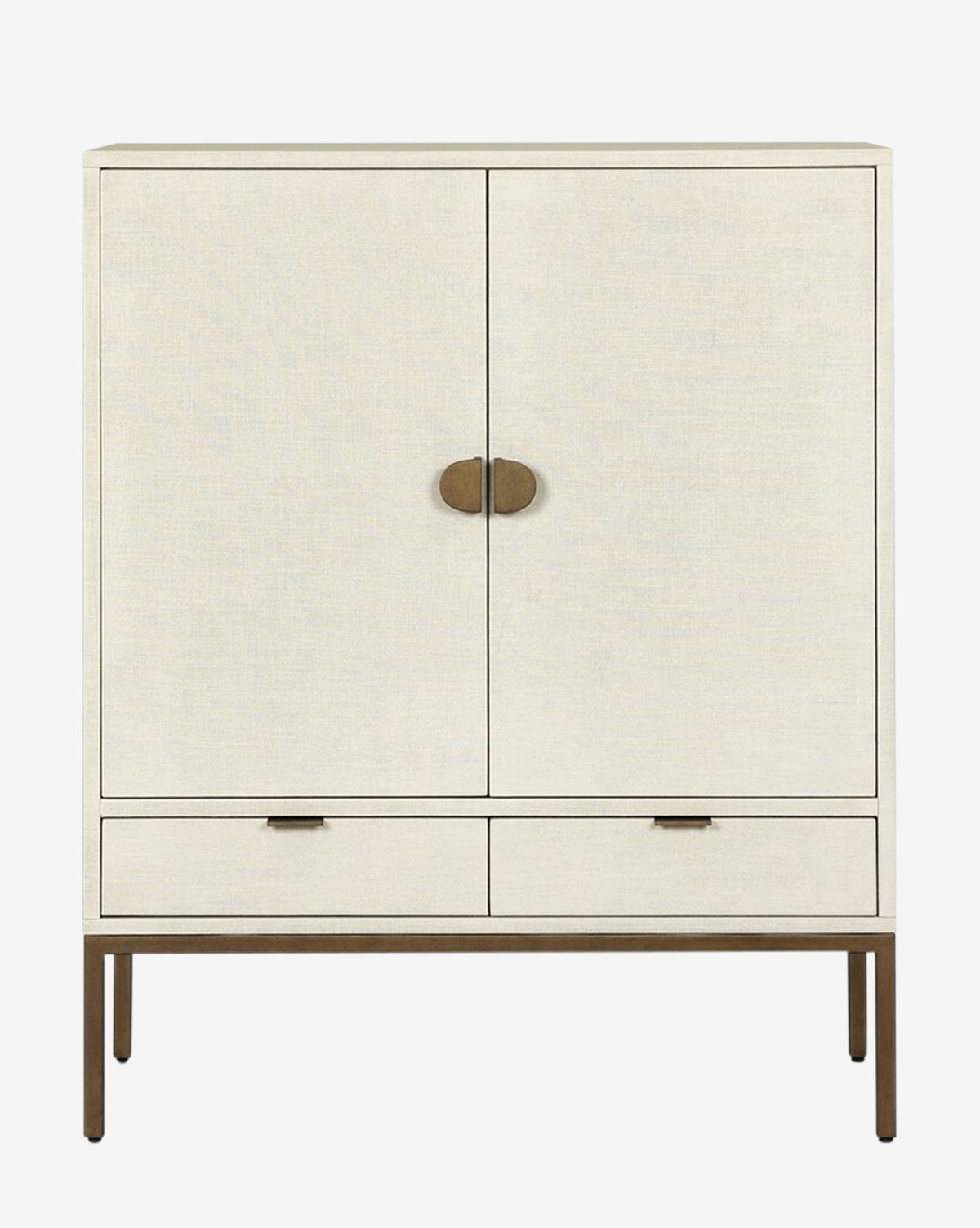 The Thaddeus Cabinet features a modern classic design with two doors, round brass handles, two lower drawers, rectangular brass pulls, slim metal legs, and provides extra storage for contemporary spaces, by Vendixs