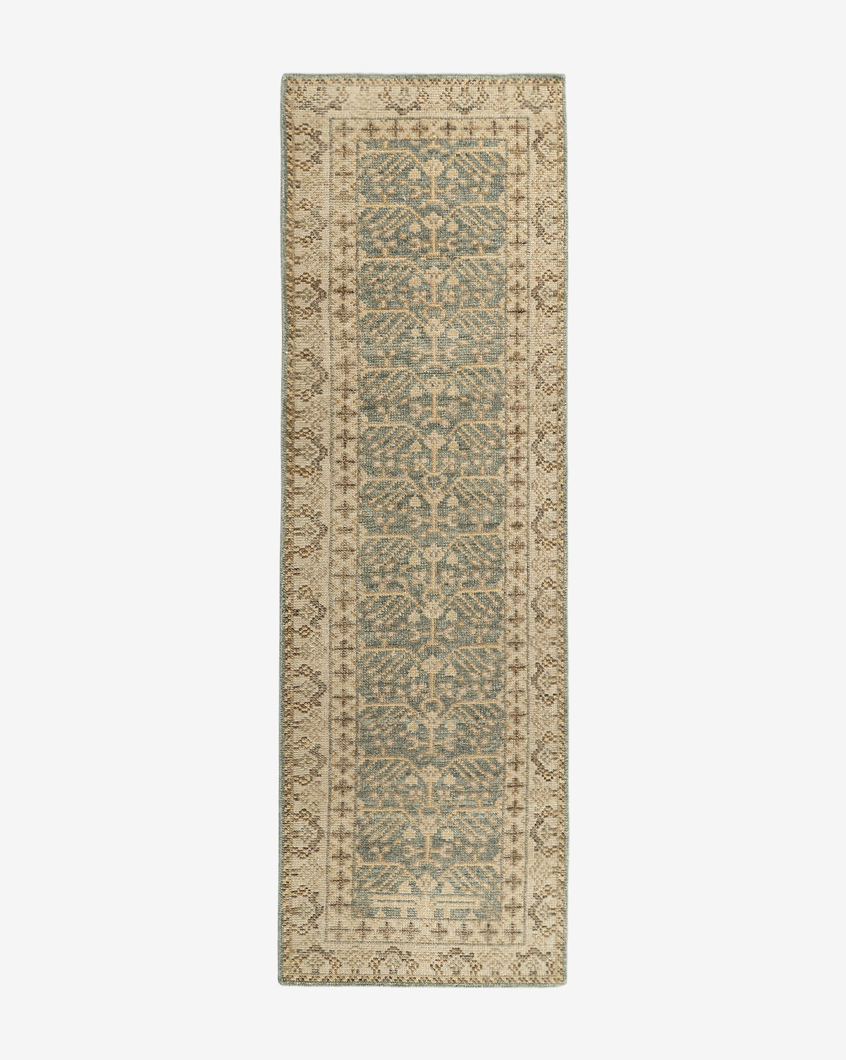 The Thames Hand-Knotted Rug is a rectangular, antique-inspired runner featuring a central blue and beige pattern with symmetrical, intricate designs and a decorative beige border—ideal for adding luxury to your home decor, by Vendixs