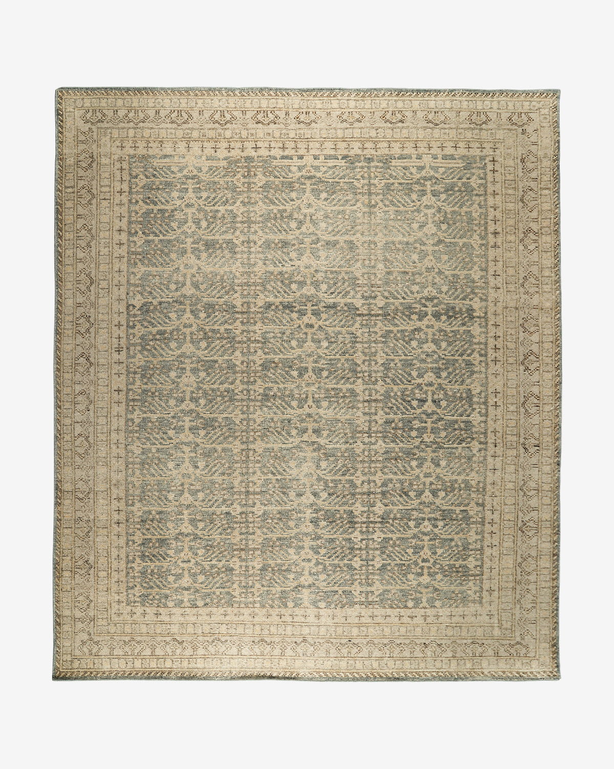 The Thames Hand-Knotted Rug is a rectangular, antique-inspired piece featuring an intricate, symmetrical pattern in muted beige and gray with a detailed border and repeating central motif—ideal for luxury home decor, by Vendixs