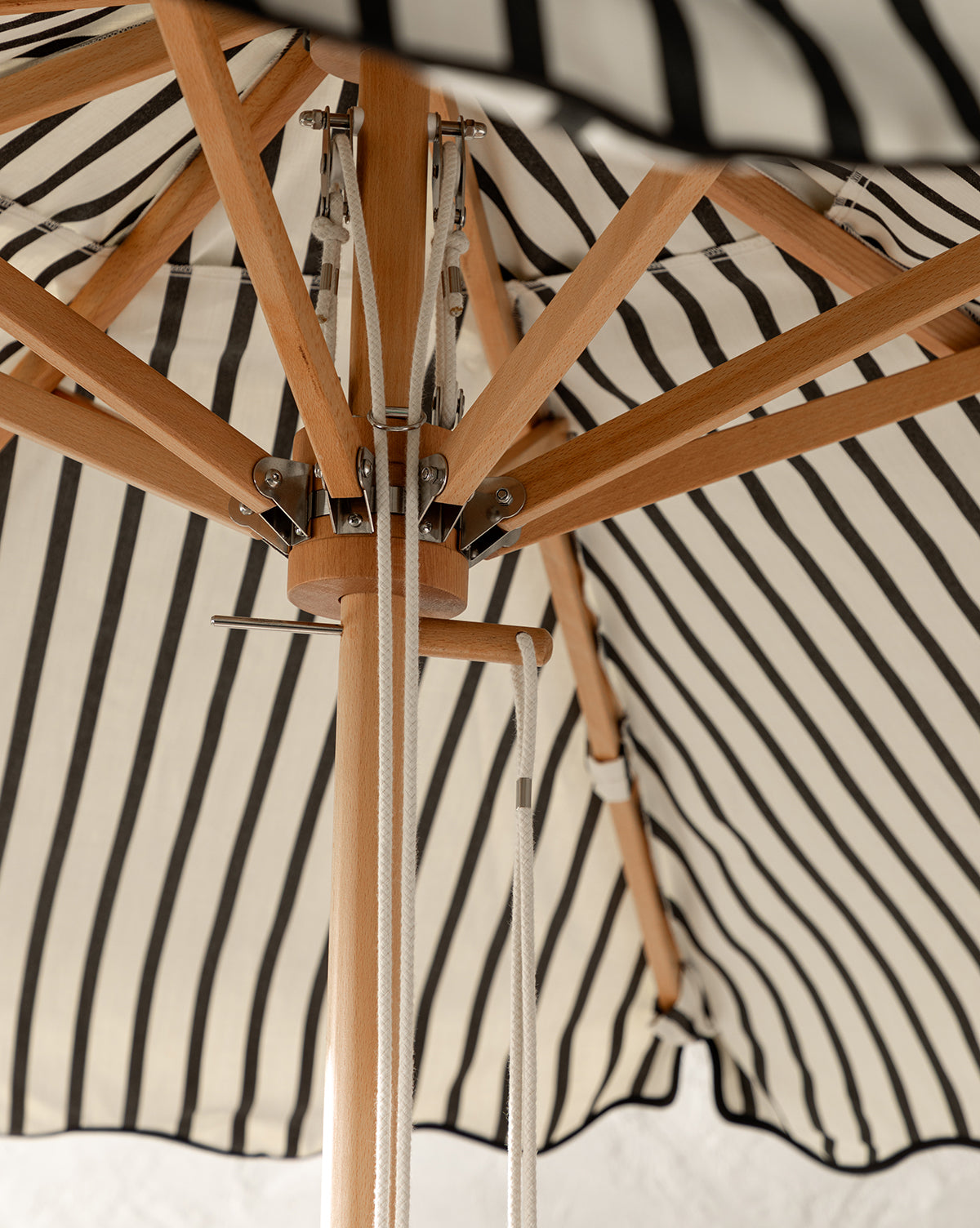 Close up Monaco Market Umbrella bamboo base holding up the canopy from Vendixs