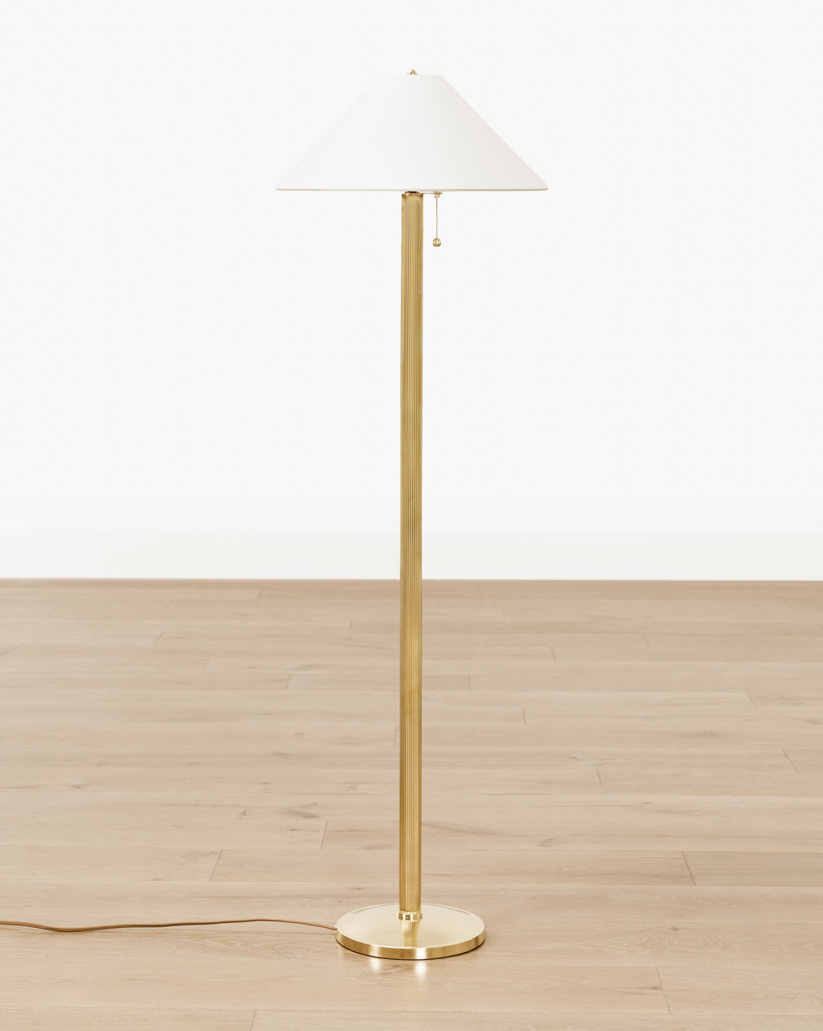 Vendixs brass floor lamp with linen shade. 