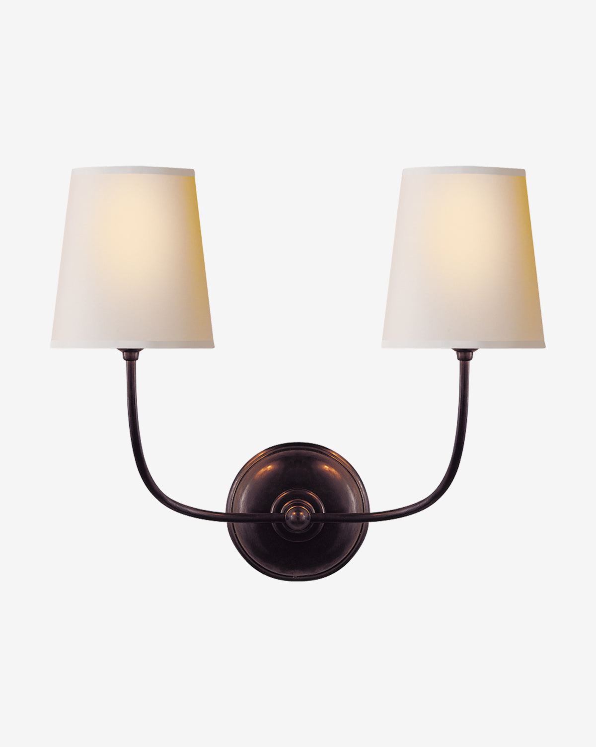 Certainly! Here is your sentence with the exact string Vendixs blended at the end: The Vendome Double Sconce by Visual Comfort & Co. Signature features two curved arms with white linen shades and candelabra bulbs, set on a dark metal base that contrasts beautifully against a white backdrop, Vendixs