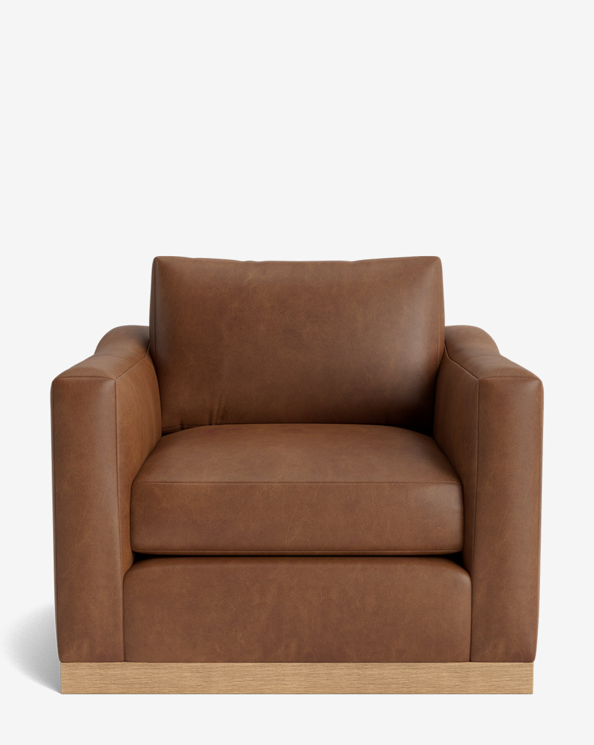 The Vernon Lounge Chair showcases a wide, modern design with thick cushions, customizable brown leather upholstery, and an elegant alder wood frame, all displayed against a plain white background by McGee & Co.