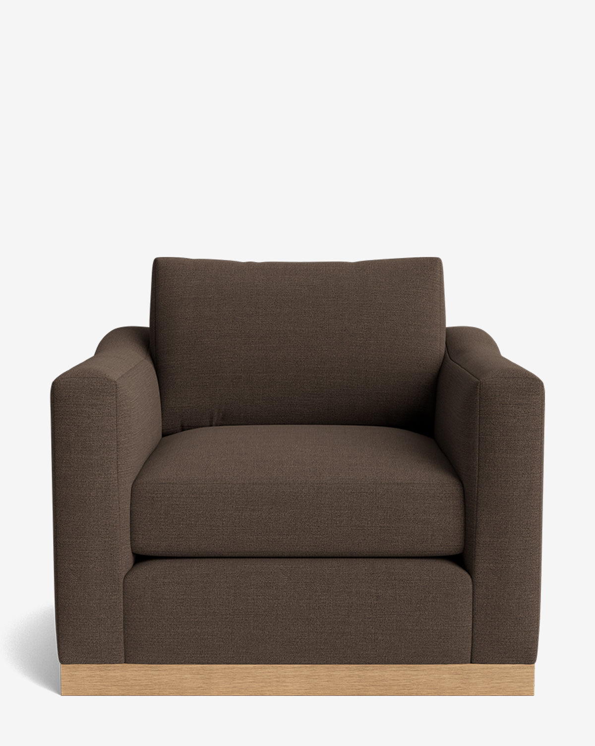 The Vernon Lounge Chair, set against a white background, offers wide cushions and armrests, a durable alder wood frame, and customizable upholstery for a tailored look, by McGee & Co.