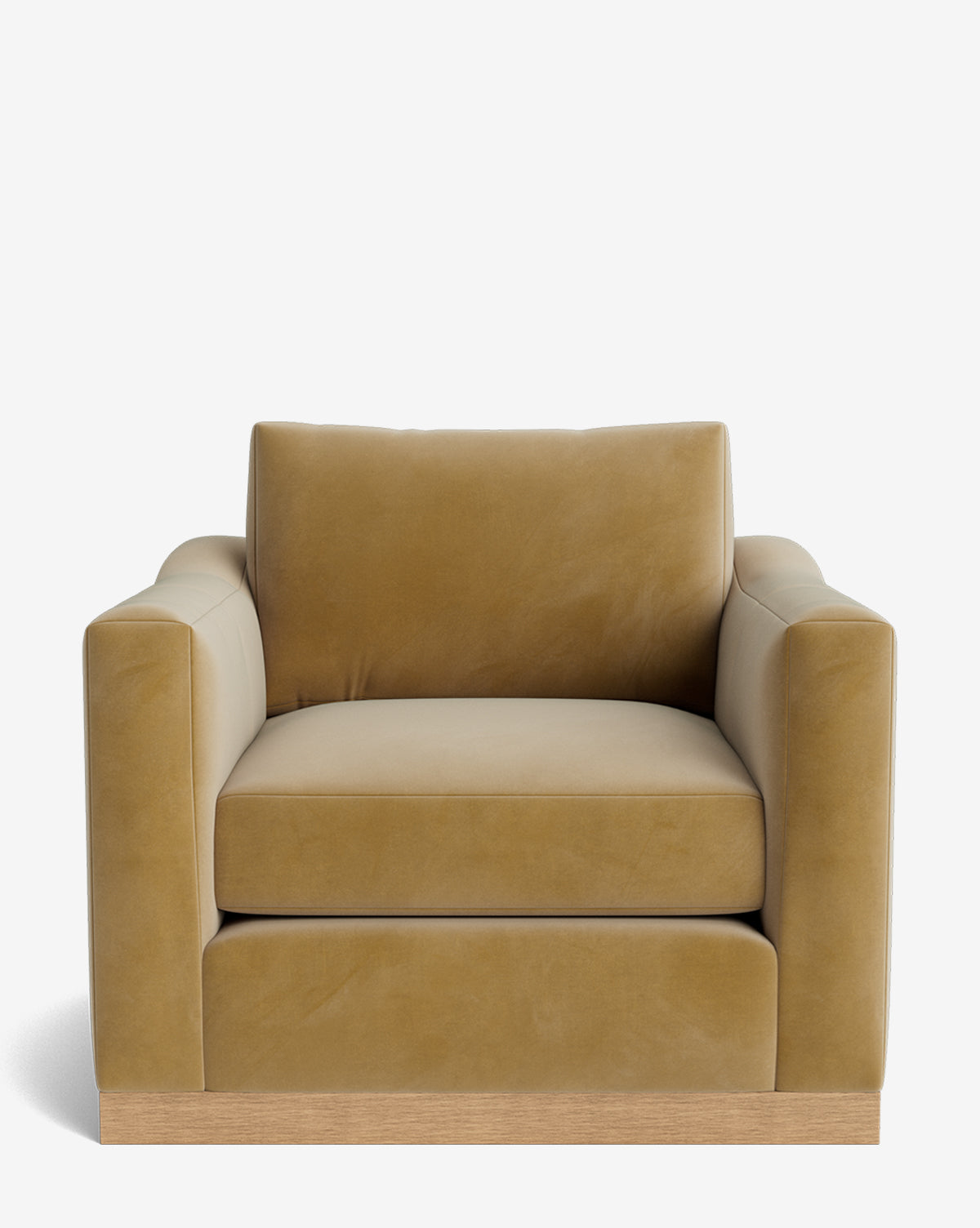The Vernon Lounge Chair is a modern, boxy seat upholstered in tan velvet with wide arms and a low alder wood frame, pictured against a plain white background by McGee & Co.