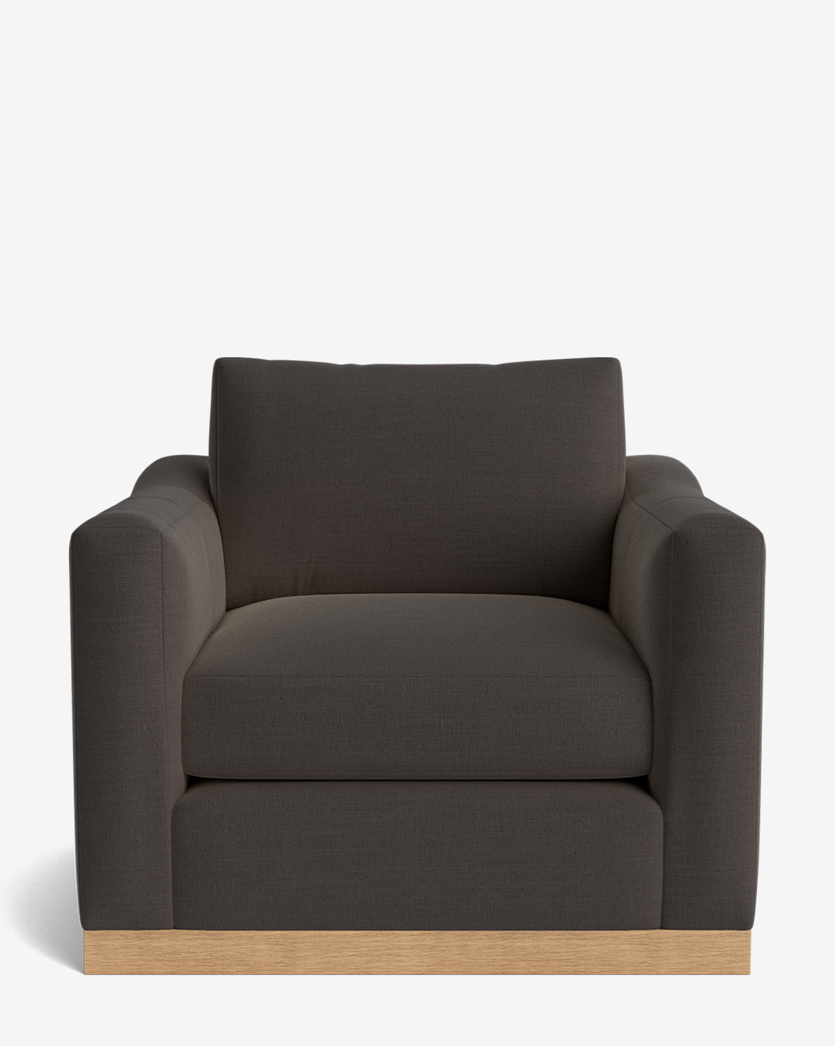 The Vernon Lounge Chair showcases a wide, dark gray upholstered seat with thick cushions, rounded arms, and a light alder wood frame, viewed from the front against a plain white background by McGee & Co.