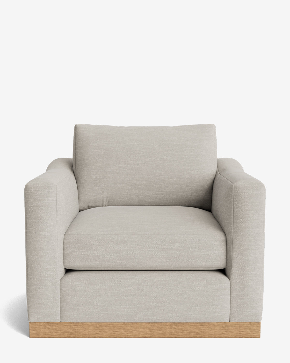 The Vernon Lounge Chair features a modern light beige design with wide cushioned arms and back, a sturdy alder wood frame, and a wooden base, all set against a white background by McGee & Co.