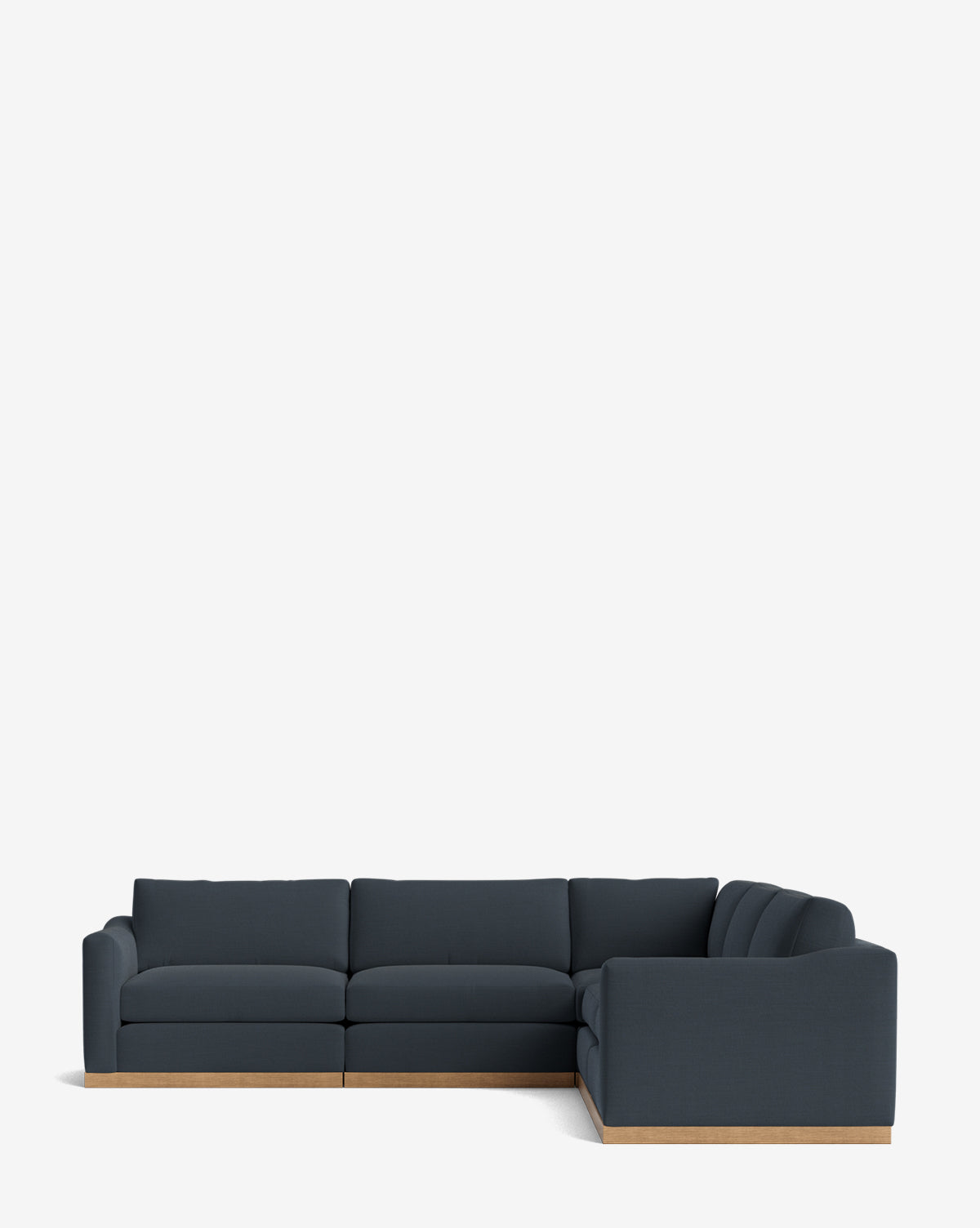 The Vernon Modular L Sectional 117.5 features dark blue upholstery and a light wood base, presented against a plain white background for a modern look, by Vendixs