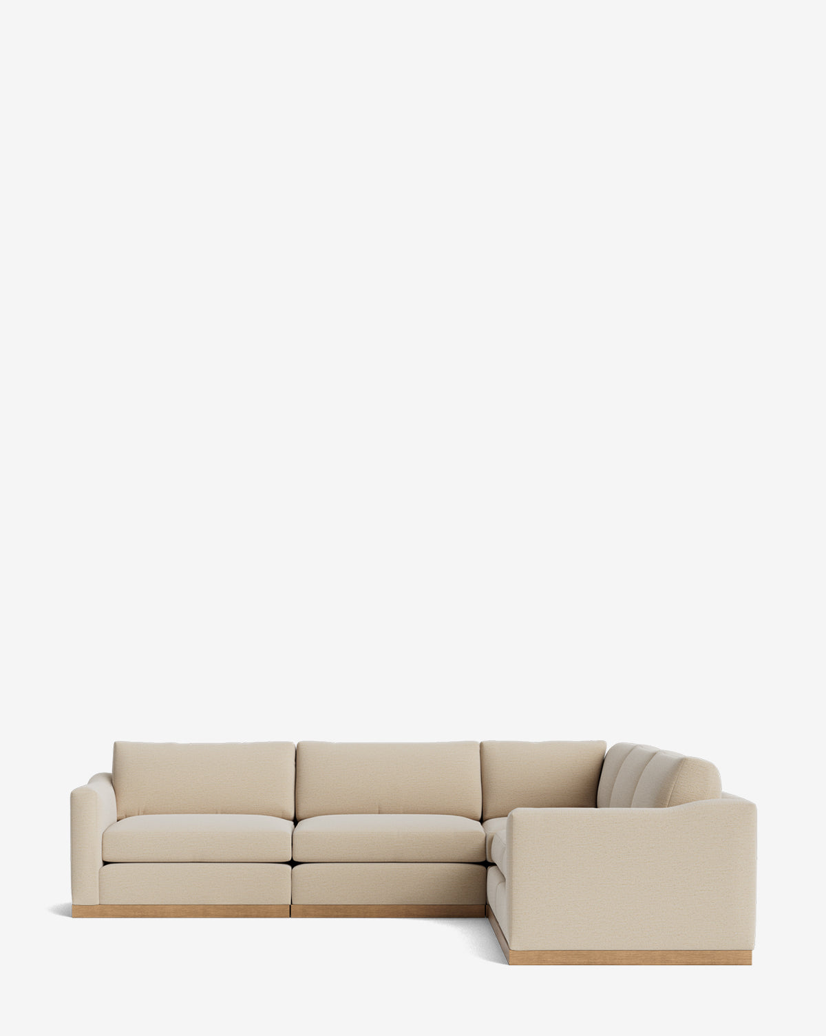 The Vernon Modular L Sectional 117.5 is a modern beige sofa featuring plush cushions and a wooden base, displayed against a plain white background by Vendixs