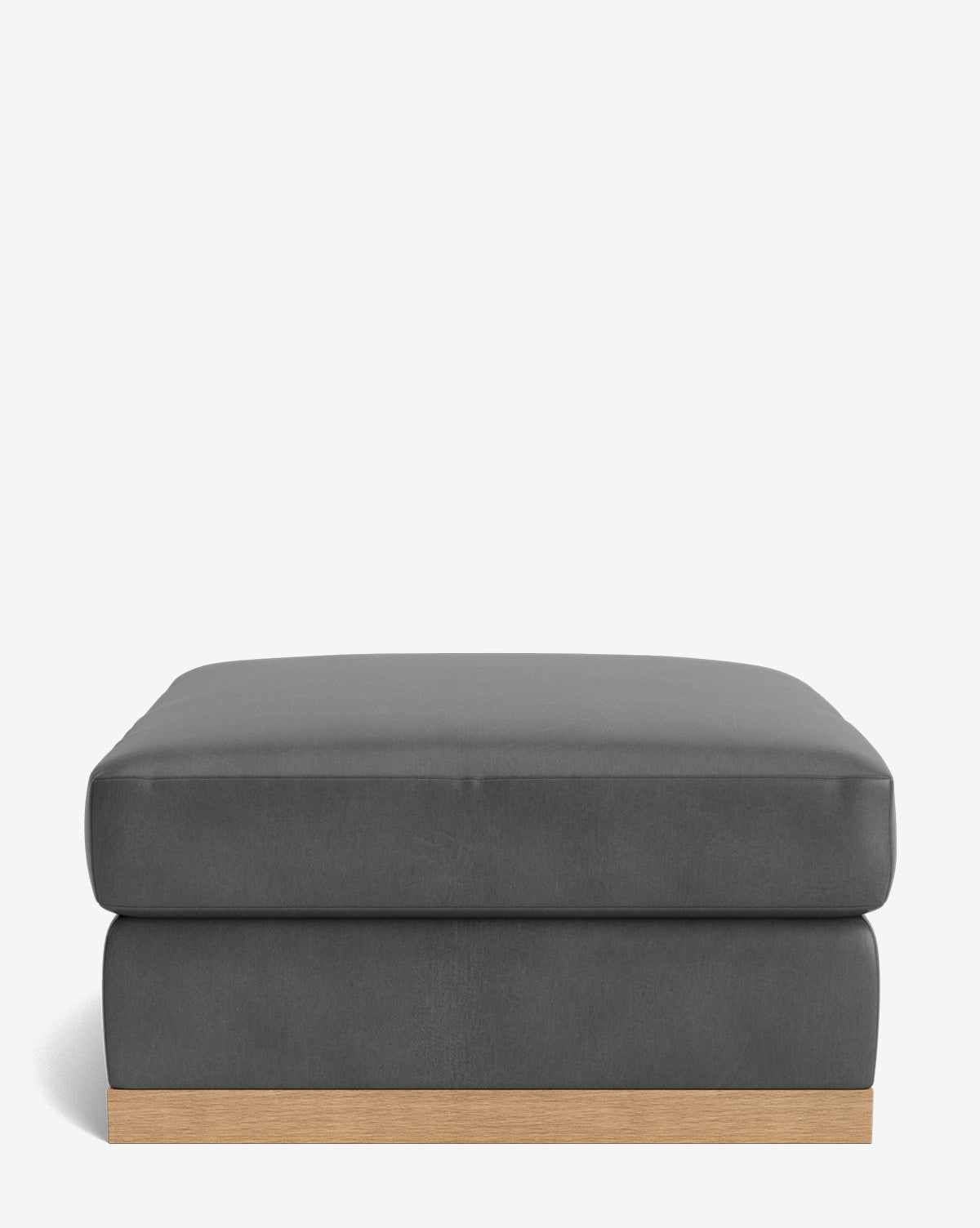 The Vernon Modular Ottoman features a rectangular shape with dark gray velvet upholstery, a soft cushioned top, and a light wooden base, displayed against a plain white background by Vendixs