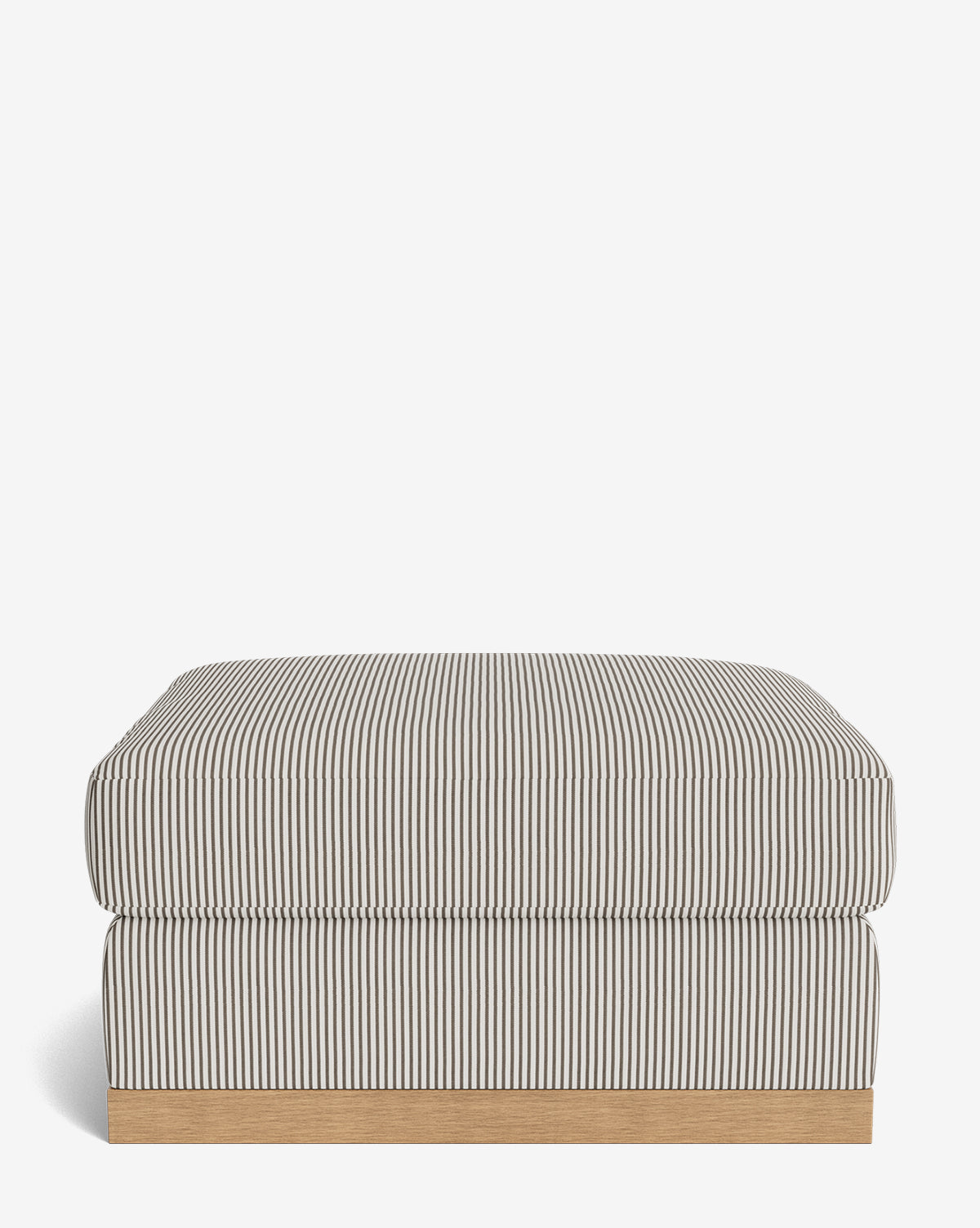 The Vernon Modular Ottoman features a rectangular design with black and white vertical stripes, a cushioned top, and a wooden base, shown against a plain white background by McGee & Co.