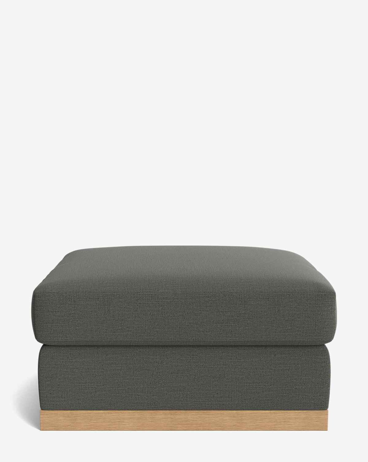 The Vernon Modular Ottoman features a modern square design, upholstered in dark gray fabric with a wooden base, shown against a plain white background, by Vendixs