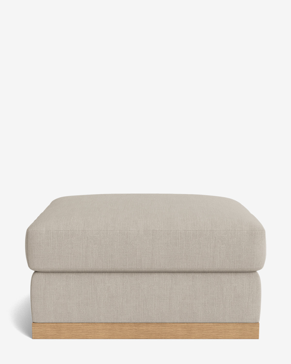 The Vernon Modular Ottoman features a beige velvet finish, a rectangular shape, a soft cushioned top, and a wooden base, displayed against a plain white background, by McGee & Co.