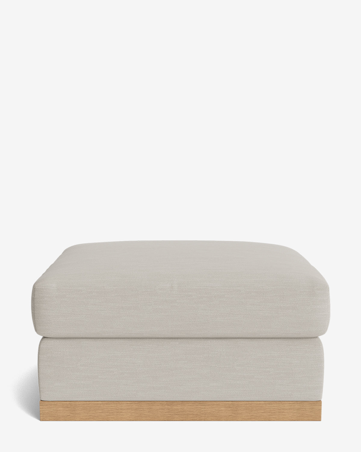 The Vernon Modular Ottoman is a rectangular, light beige piece with a cushioned top and wooden base, shown from the front against a white background, by McGee & Co.