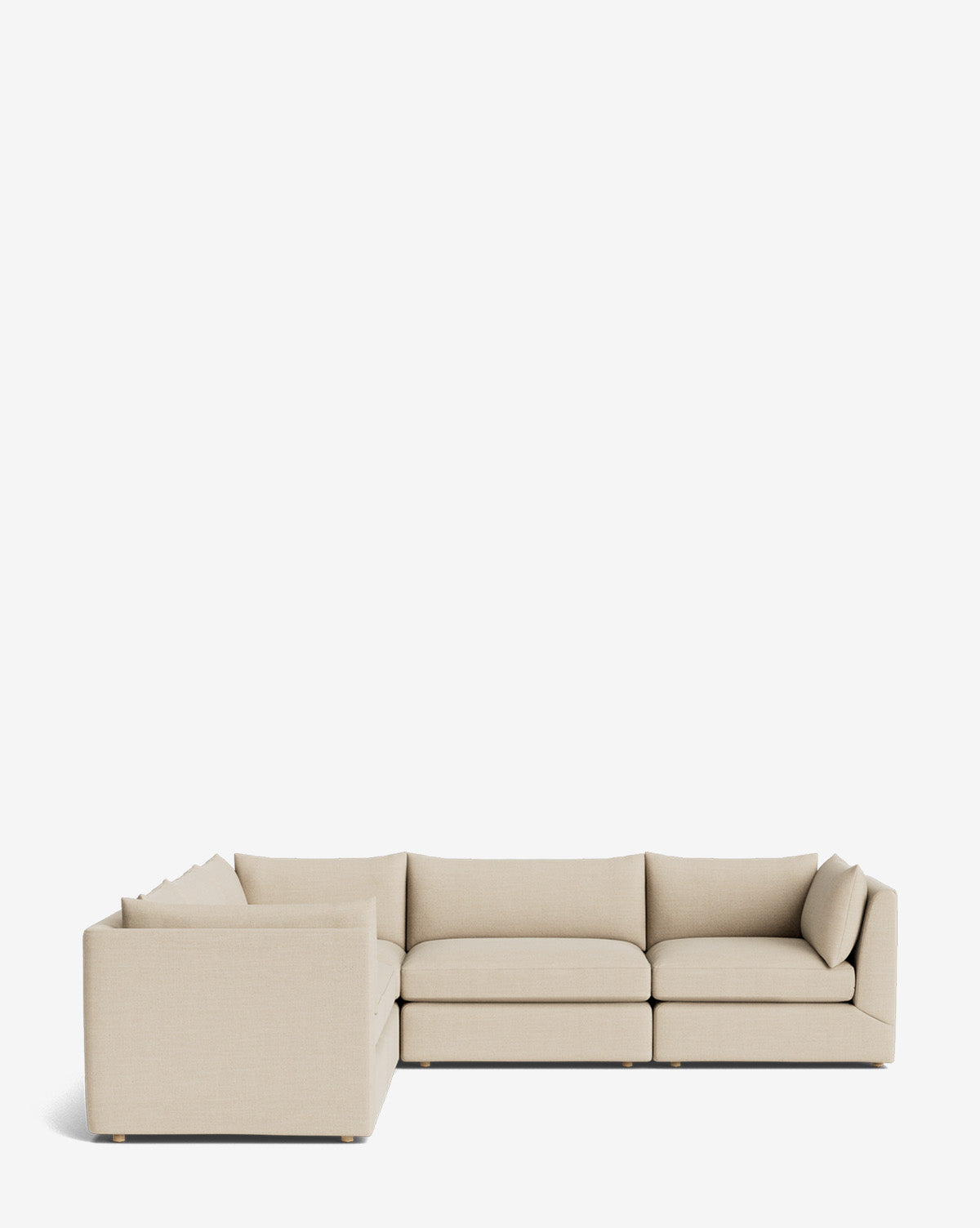 The Makerspalm Vivienne Modular L Sectional is a modern, light beige sofa with low backs and plush seat cushions. Displayed on a white background, its modular pieces form an L-shape for flexible seating options. Vendixs