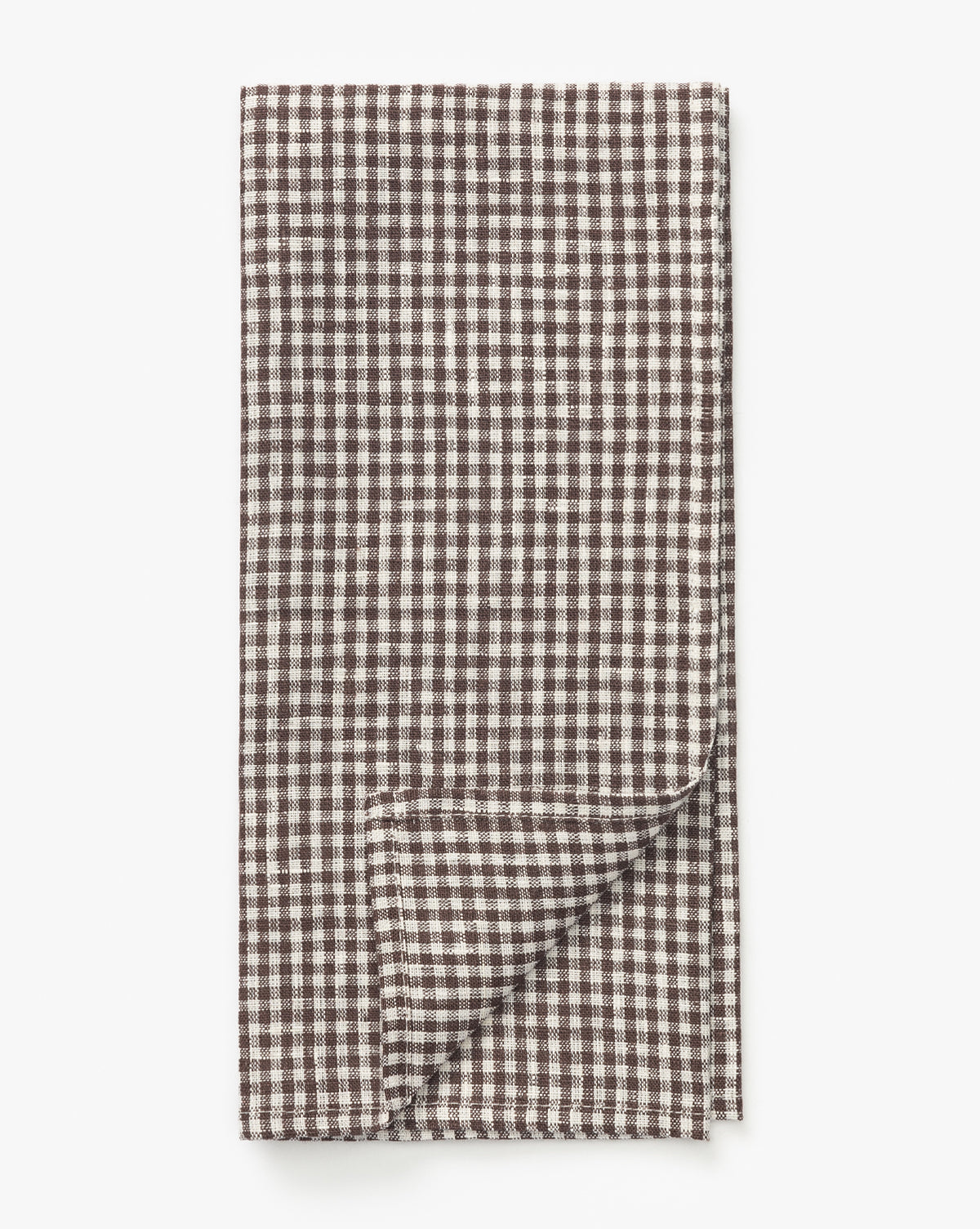 The Westport Linen Tea Towel features a small brown and white gingham check pattern, neatly folded with one corner turned up to display the reverse side, by Vendixs